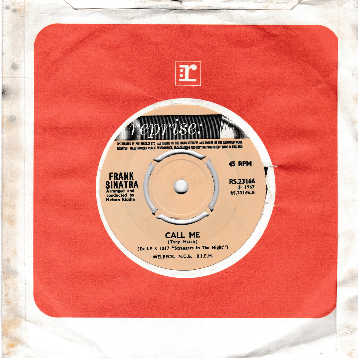 A vintage Frank Sinatra 45 RPM vinyl record in a red paper sleeve with a beige centre label. 