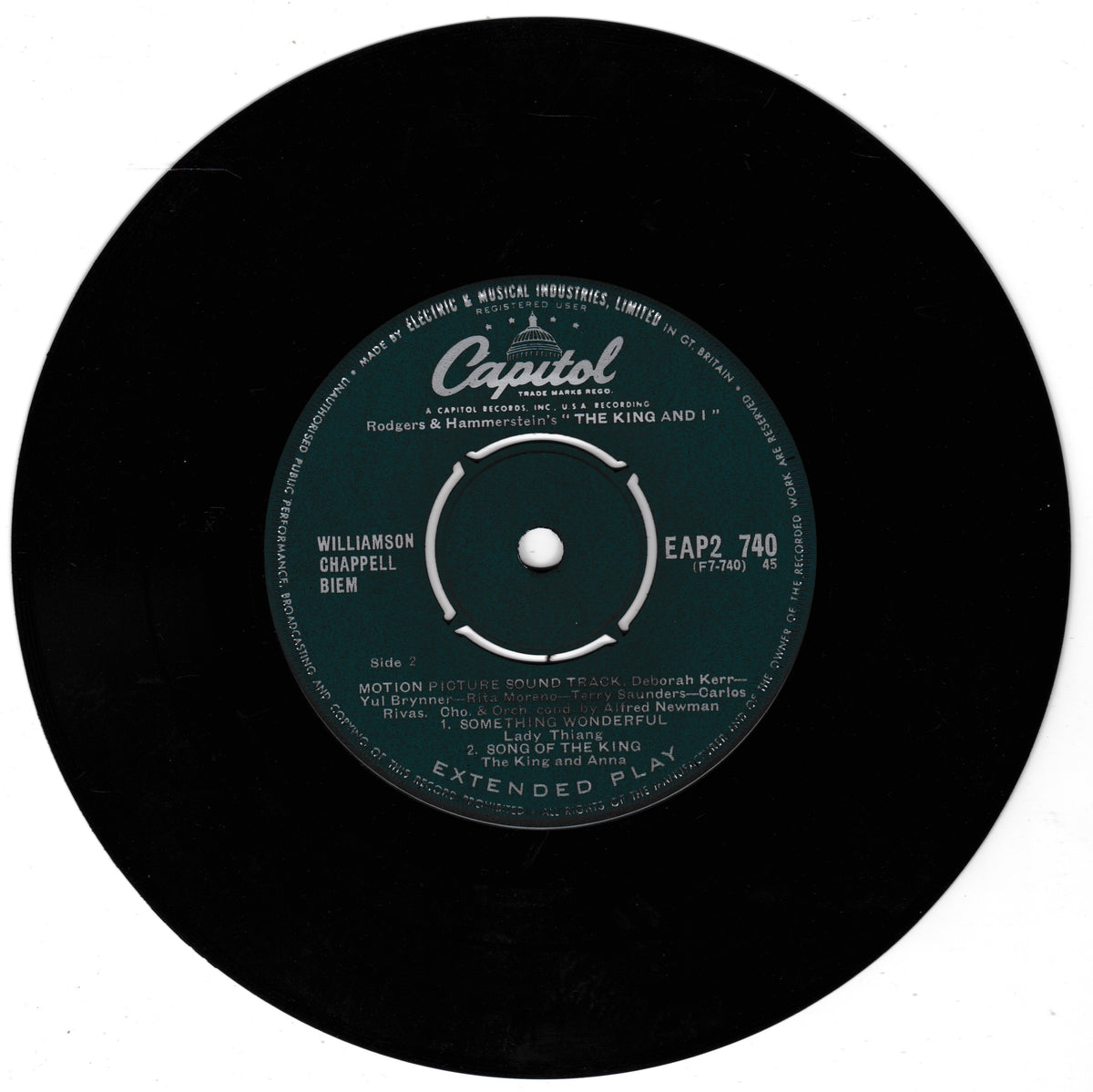 A black vinyl record with a dark green Capitol label.