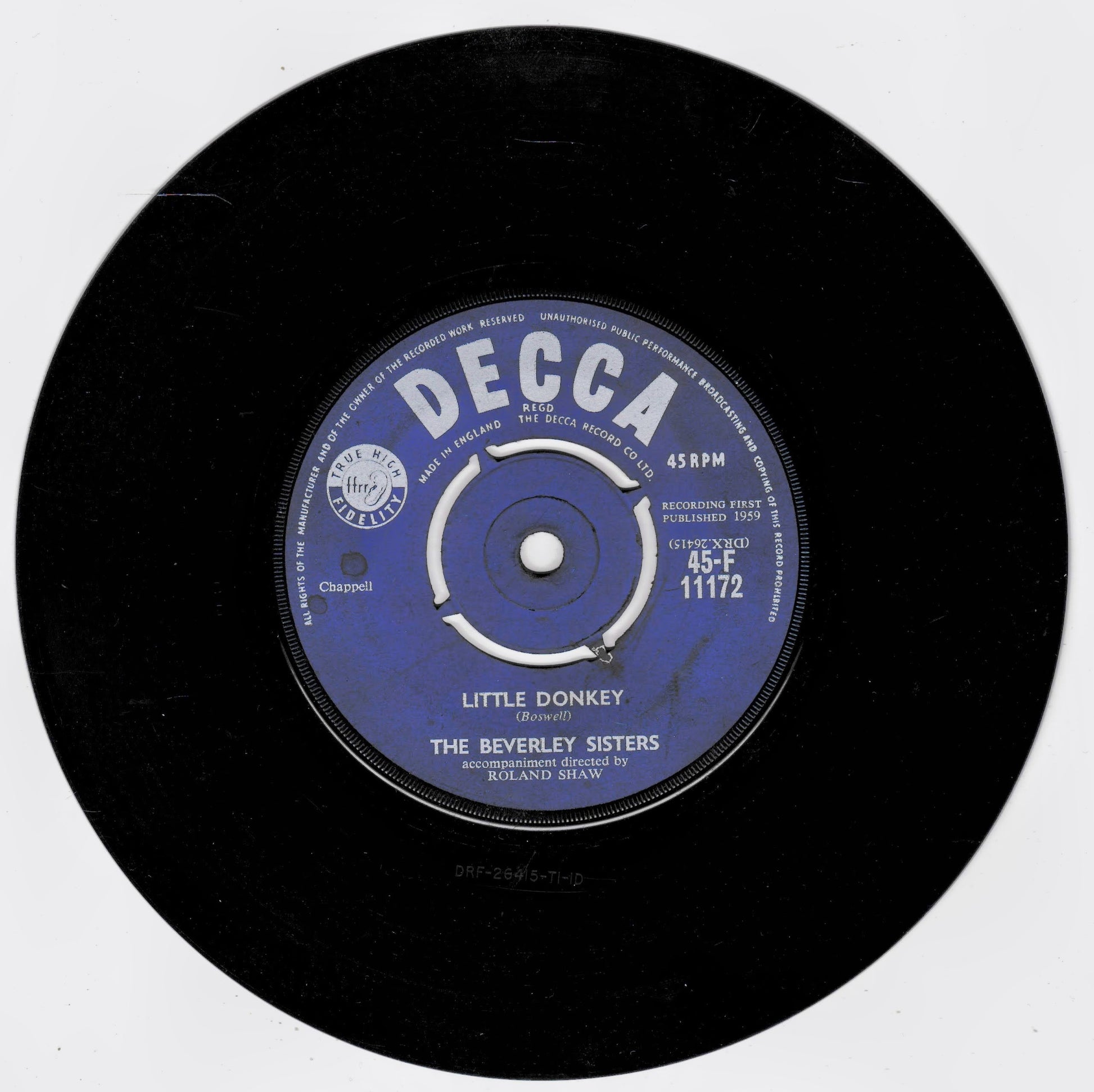A black 7-inch vinyl record with a blue and white Decca label, featuring the song 'Little Donkey' by The Beverley Sisters.