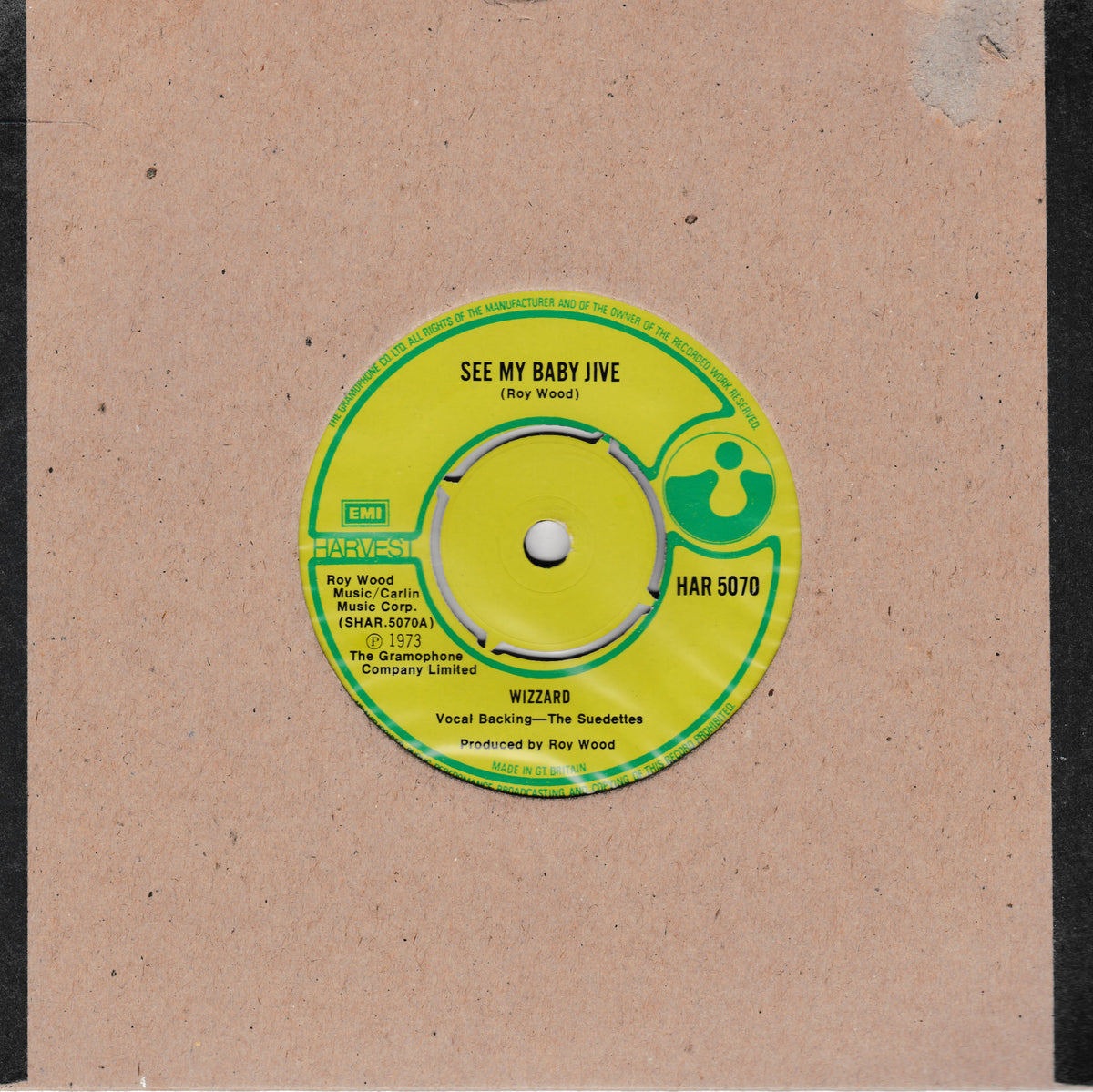 A vintage 7-inch vinyl record label for 'See My Baby Live' by Ray Wood and Wizzard, featuring a bright yellow-green and green design on a brown cardboard backing.