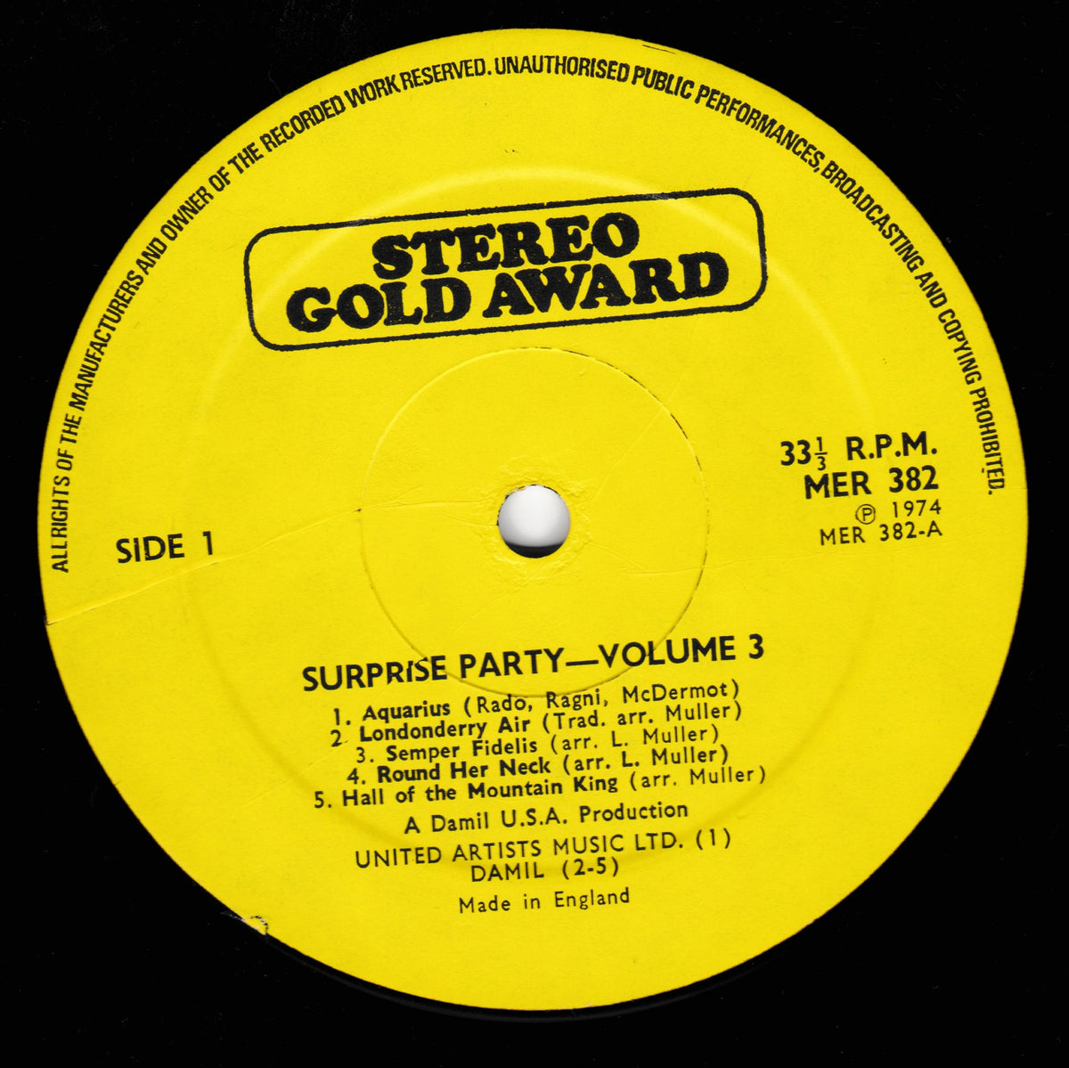 A bright yellow vinyl record label for 'Surprise Party - Volume 3' by The Gate Crashers, featuring the 'Stereo Gold Award' logo at the top, photographed on a black background.