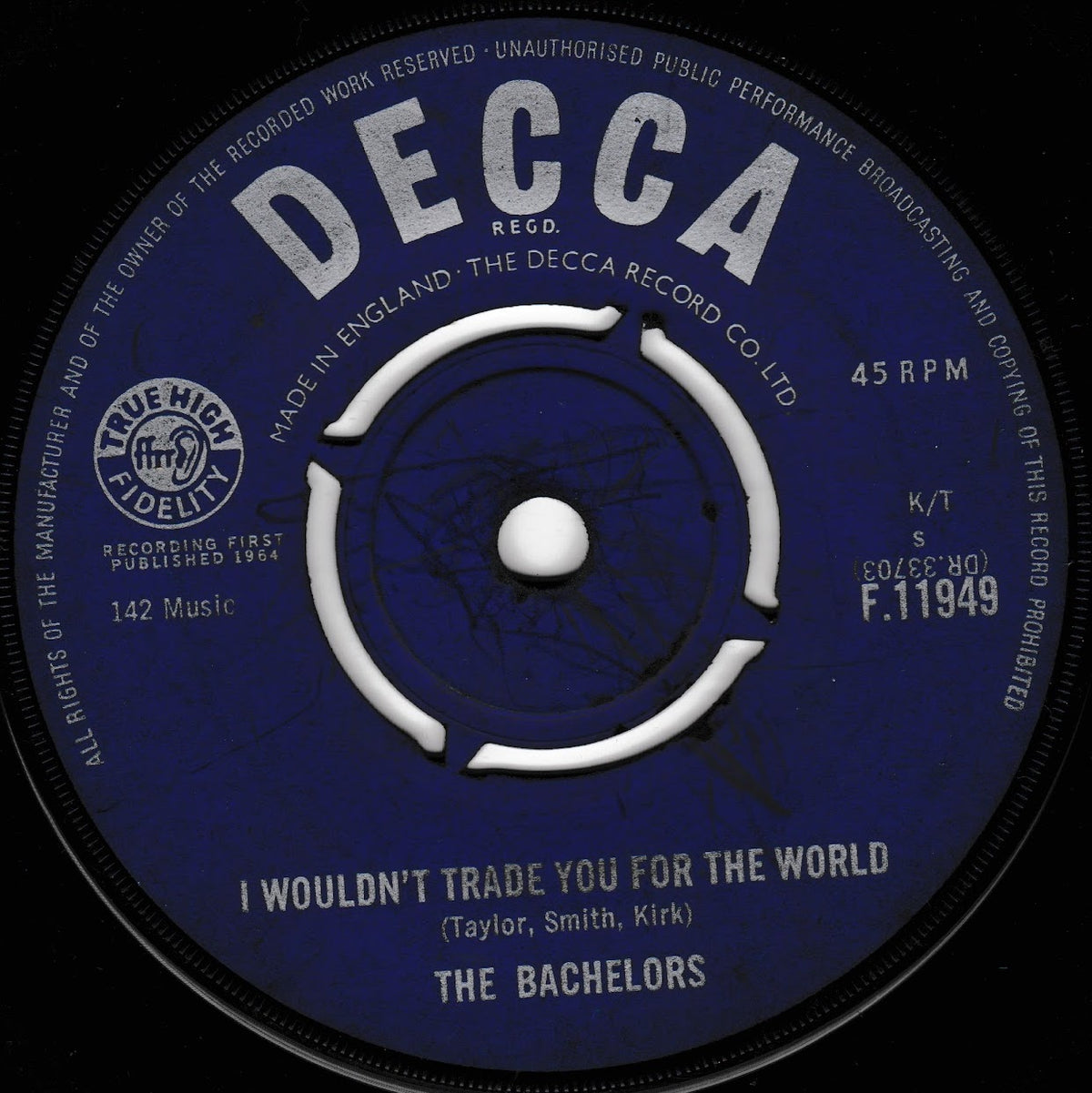 A vintage Decca 7-inch vinyl record label for 'I Wouldn't Trade You For The World' by The Bachelors, featuring a deep blue label with white text and a white centre spindle.