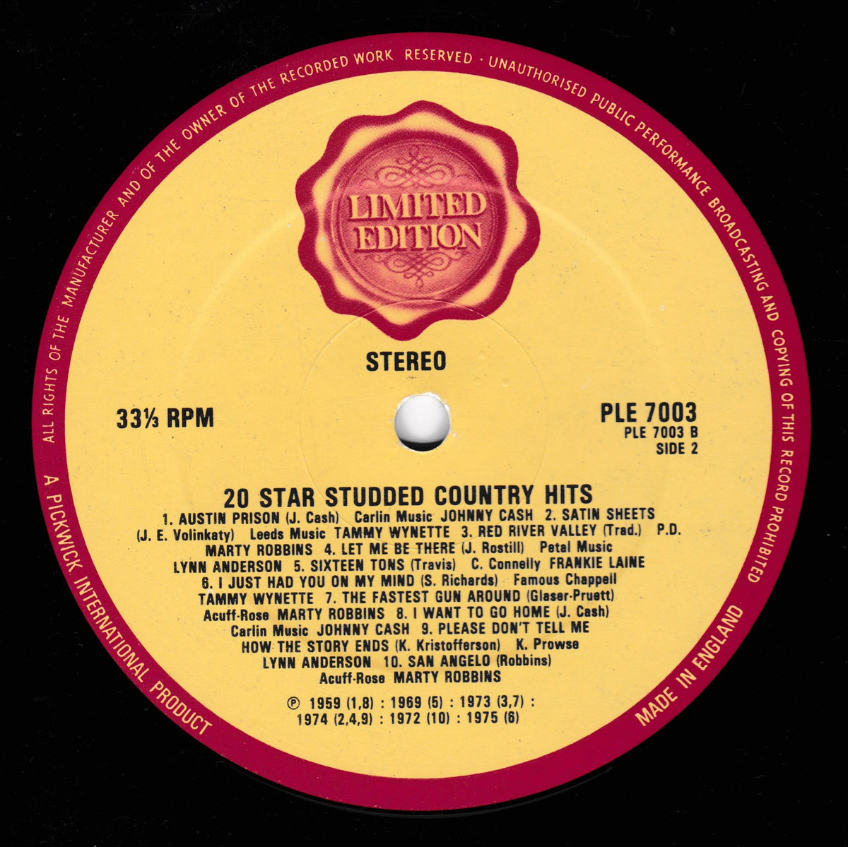 A vinyl record label for a limited edition 12-inch stereo release titled '20 Star Studded Country Hits' on the Parlophone label. The label features a yellow centre with a red outer ring and a red rose emblem at the top, listing various country music artists and tracks.