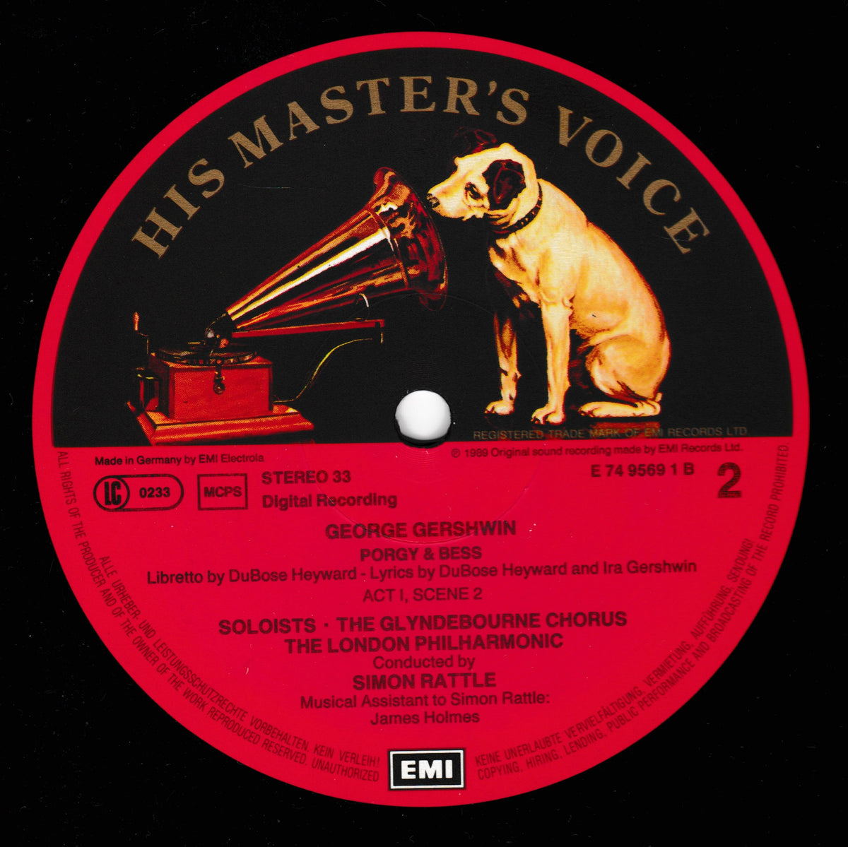 A vinyl record label for 'Porgy and Bess' by George Gershwin, featuring a red outer ring, black centre, and an illustration of a dog sitting beside a gramophone. Visible brands include EMI and the EMI Records logo at the bottom.