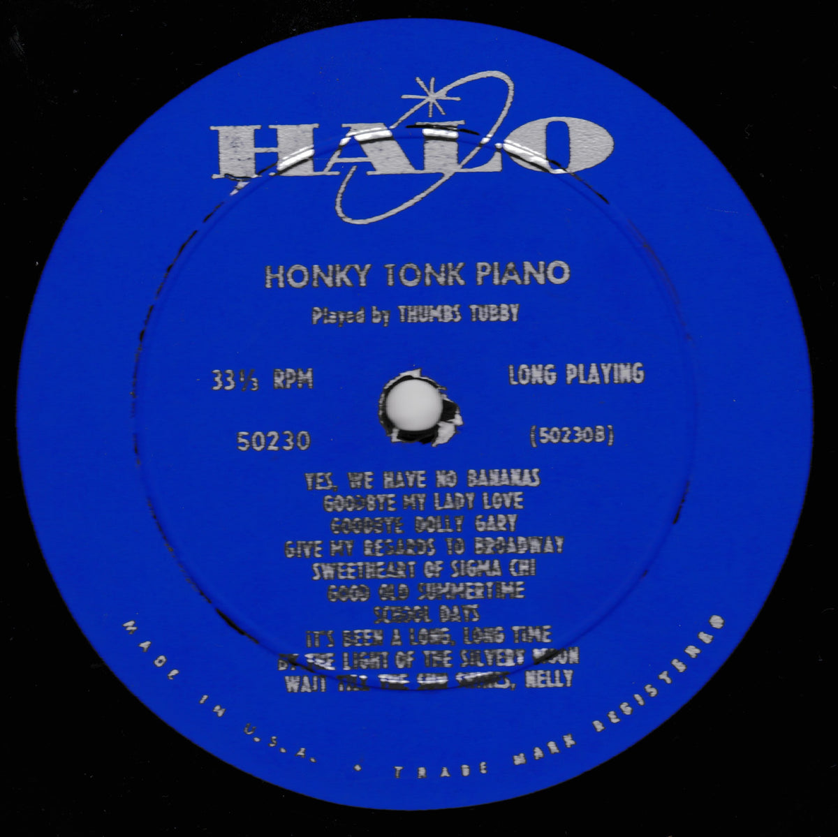 A blue vinyl record label with the HALO logo and the title 'Honky Tonk Piano' on a black background.