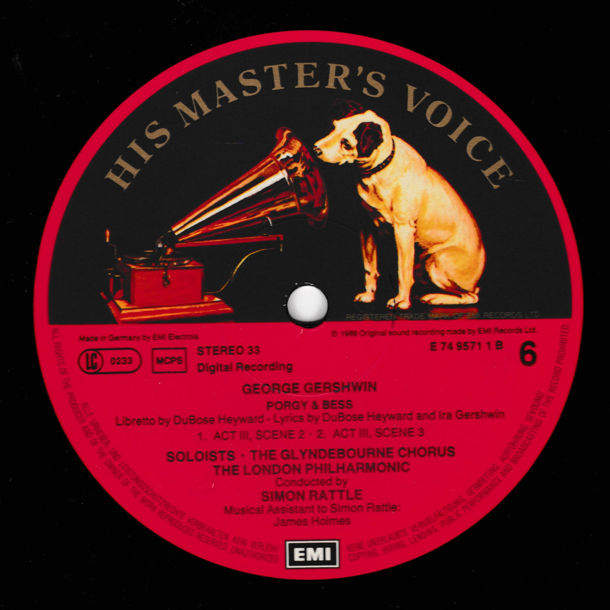 A vinyl record label for 'Porgy and Bess' by George Gershwin, featuring a black background with a large red circular label. The label includes an illustration of a dog sitting next to a gramophone and lists tracks and 'Soloists - The Glyndebourne Chorus.