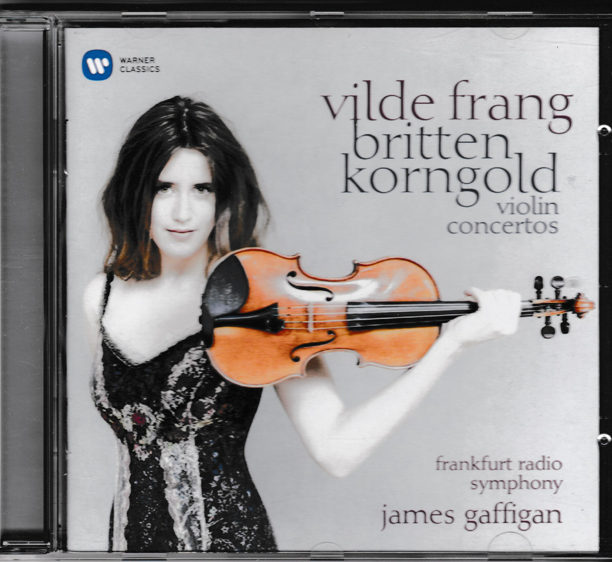CD cover for 'Vilde Frang, Britten, Korgold' violin concertos, released on Warner Classics. The cover features a portrait of Vilde holding a violin against a light gray background with black text.
