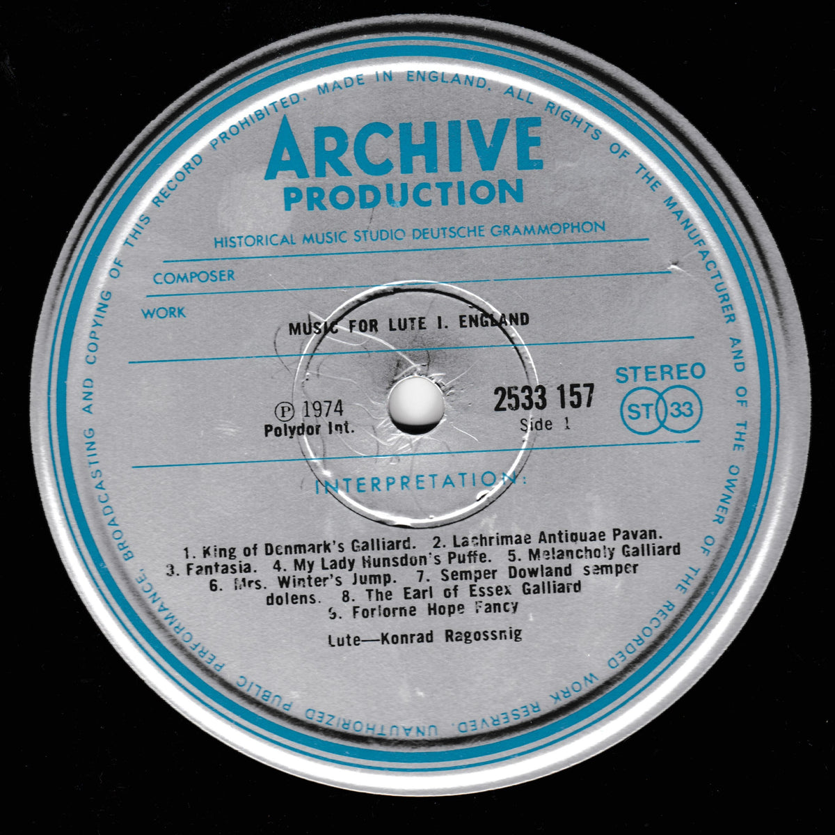 A close-up of a vinyl record label reading 'Archive Production' with blue text and a silver-gray center label on a black background. The tracklist includes 'Music for Lute 1.