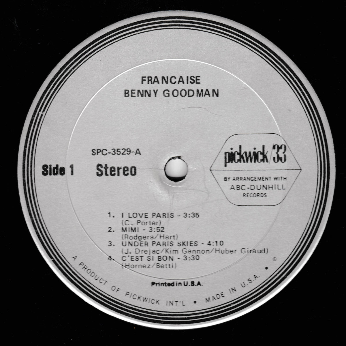 A close-up of a vinyl record label for Benny Goodman's Francaise, showing track listings and the Pickwick 33 logo on a black background.