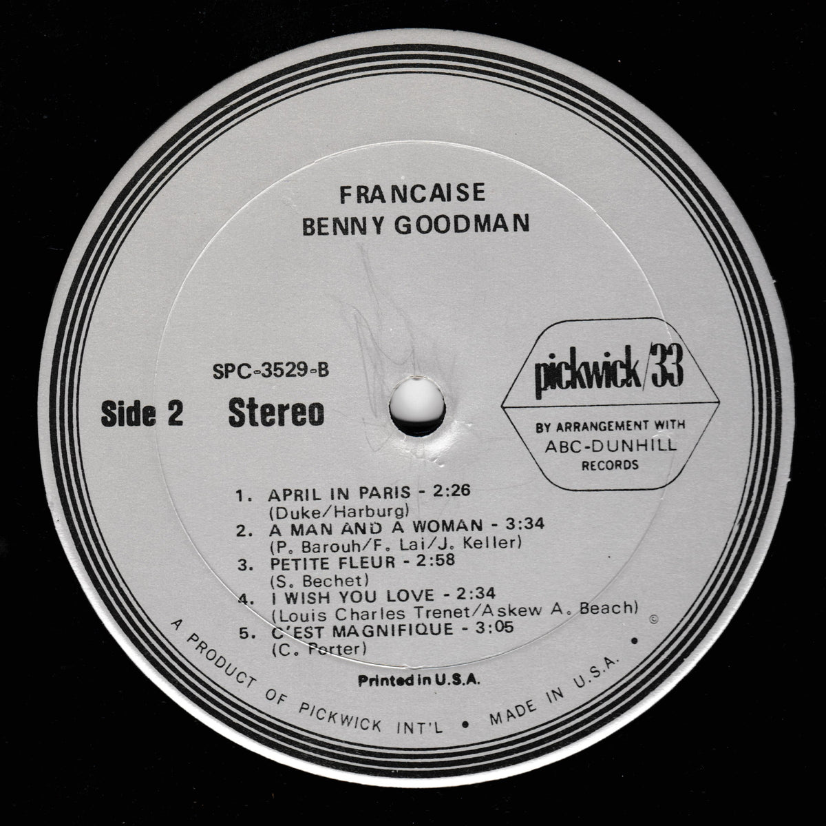 A close-up of a vintage vinyl record label for Benny Goodman's Francaise, showing track listings and the Pickwick 33 logo on a black background.