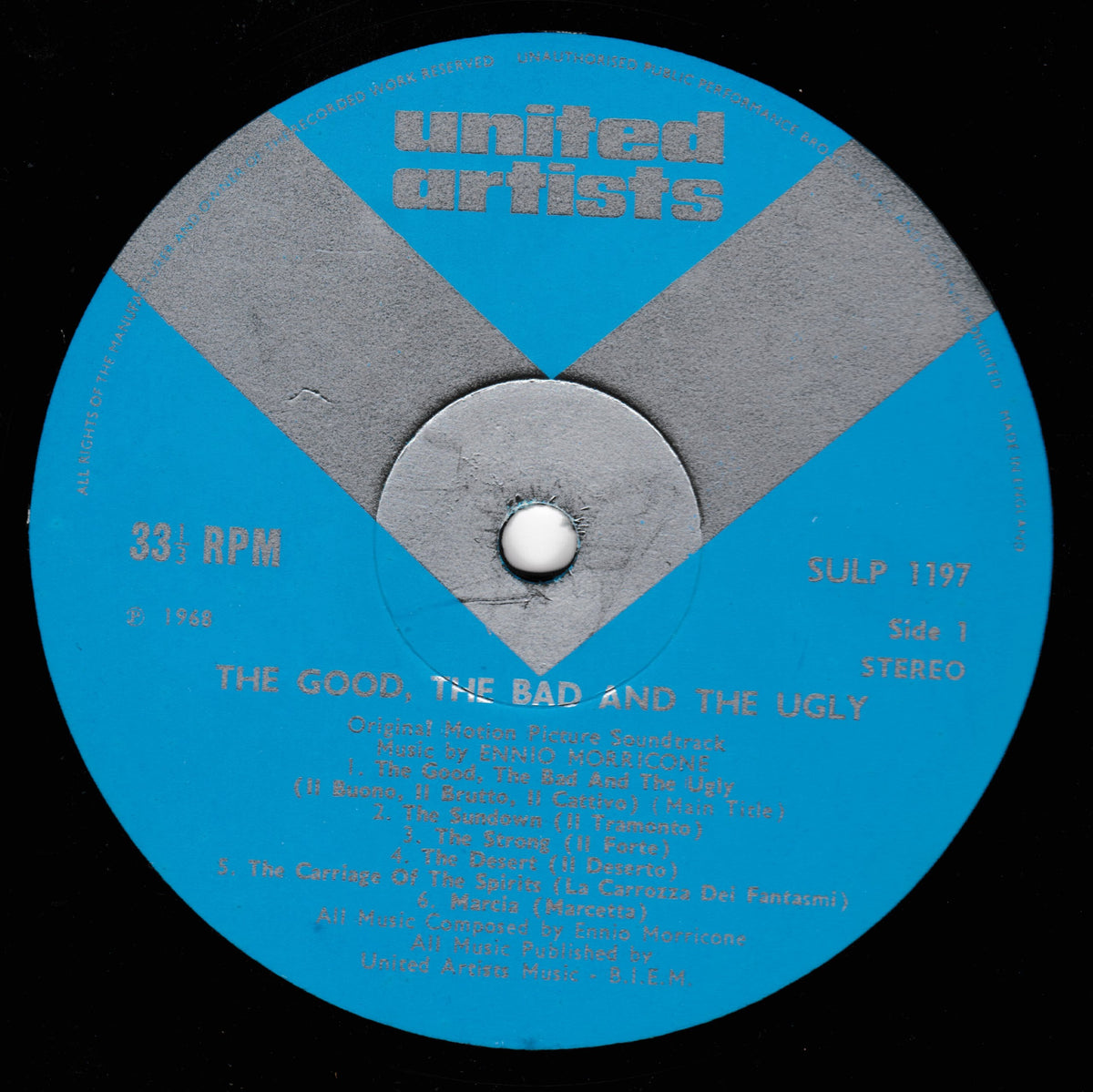 A vinyl record label with a bright blue and gray design, featuring the text 'united artists' and track listing for 'The Good, The Bad and The Ugly'.