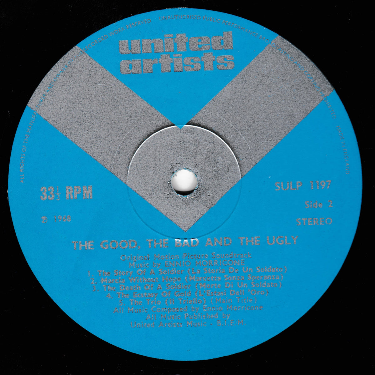 A blue and gray vinyl record label from United Artists featuring the album 'The Good, The Bad and The Ugly' by John Howard & Davy Jones, photographed against a black background.