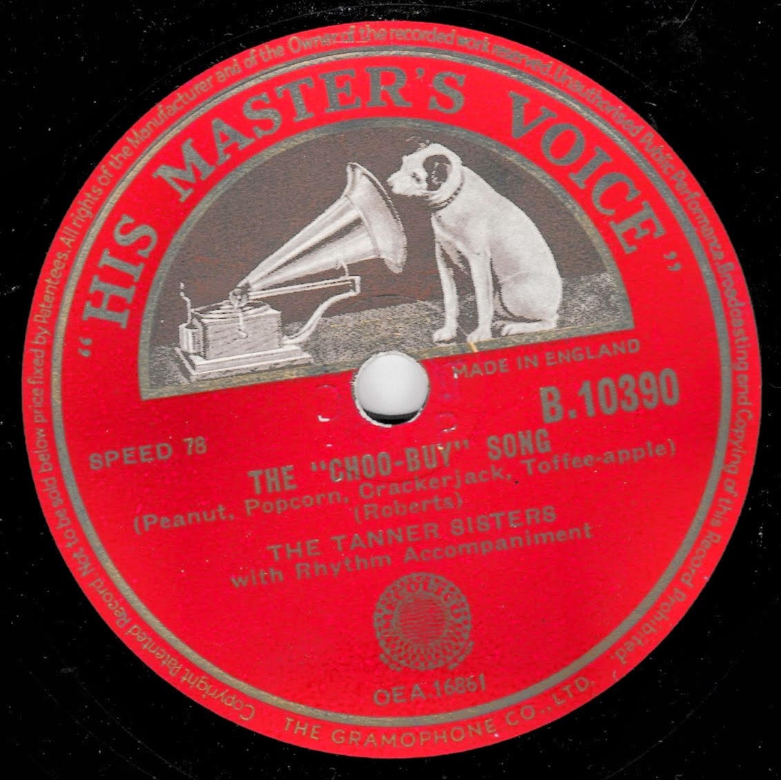 A vintage red 78rpm shellac record label for 'The Choo-Buy Song' by The Tanner Sisters, featuring 'His Master's Voice' branding and an illustration of a dog next to a gramophone on a black background.
