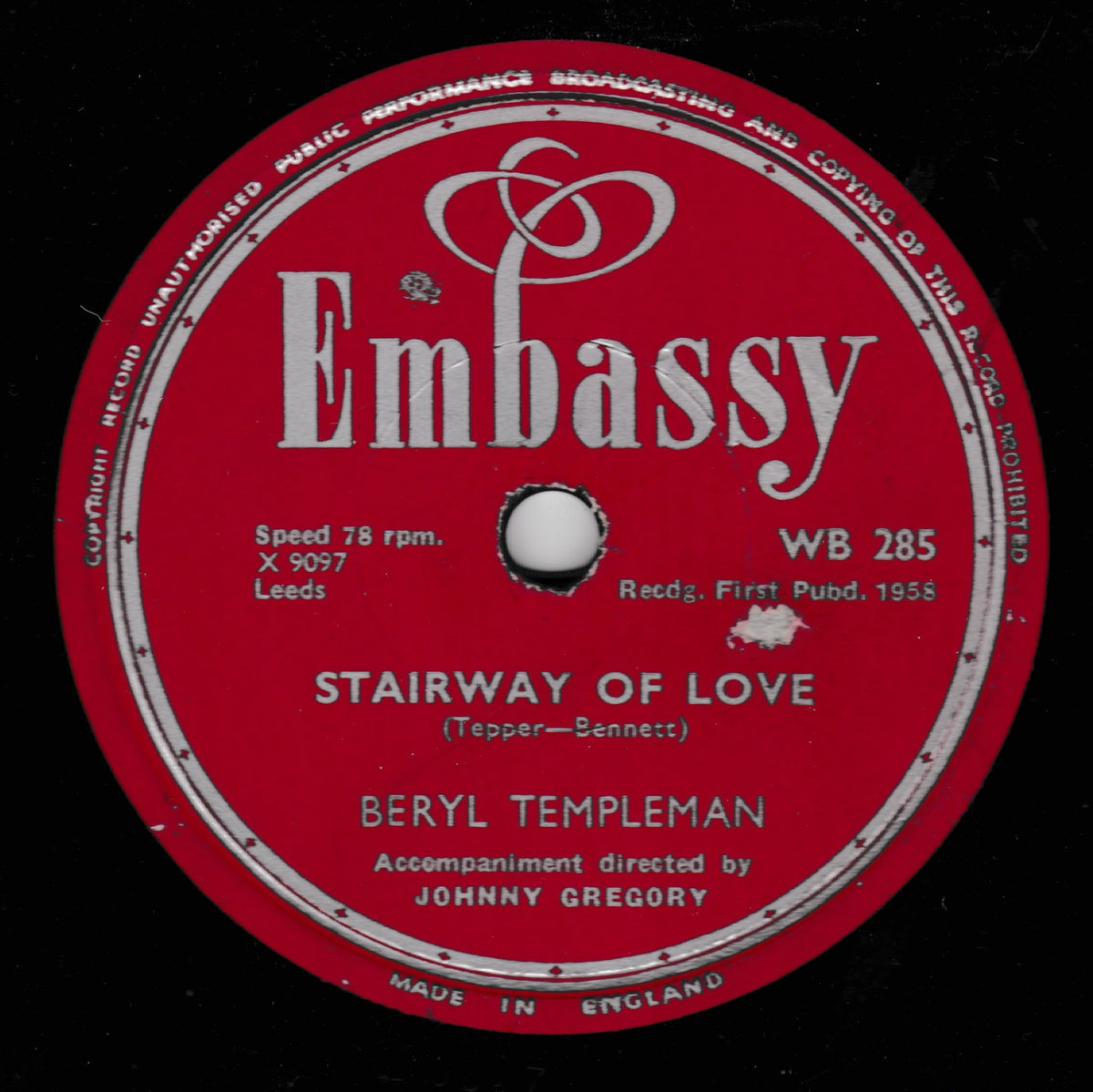 A vintage red shellac record label for the song 'Stairway of Love' by Beryl Templeman, featuring the prominent white 'Embassy' logo and black text on a black background.