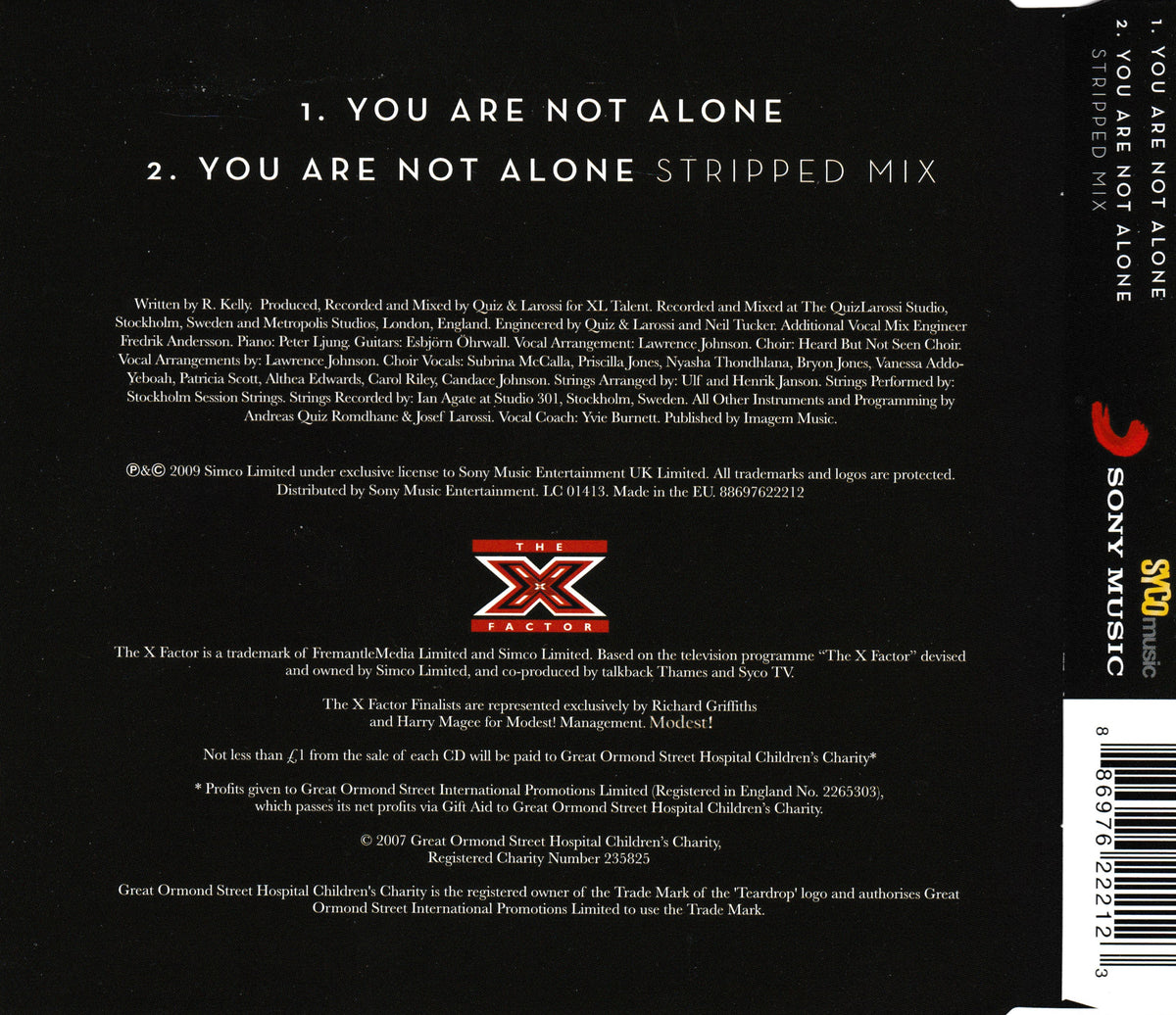 The back cover of a CD release for 'You Are Not Alone', featuring track listings, copyright details, the X Factor logo, and a Sony Music branding on a black background.
