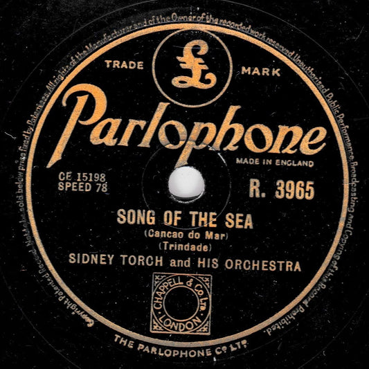 A vintage Parlophone record label for 'Song of the Sea' by Sidney Torch and His Orchestra, featuring gold text and logo on a black disc.