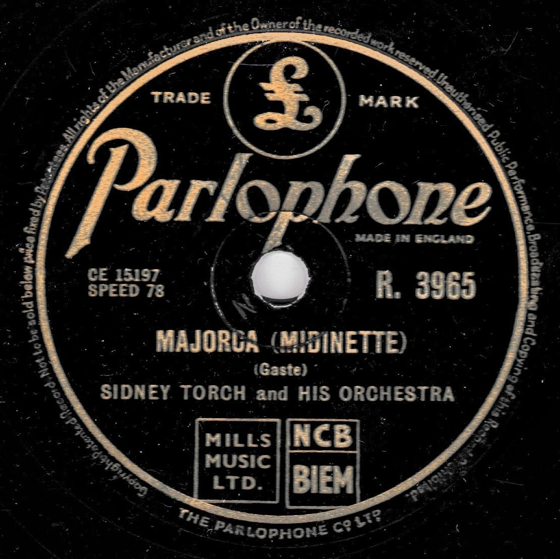 A vintage Parlophone record label for 'Majorca (Midinette)' by Sidney Torch and His Orchestra, with cream text and logo details on a black disc.