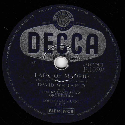 A vintage Decca 10-inch shellac record label for David Whitfield's 'Lady of Madrid' with The Roland Shaw Orchestra, featuring a dark blue and black background with silver-gray text and graphics.