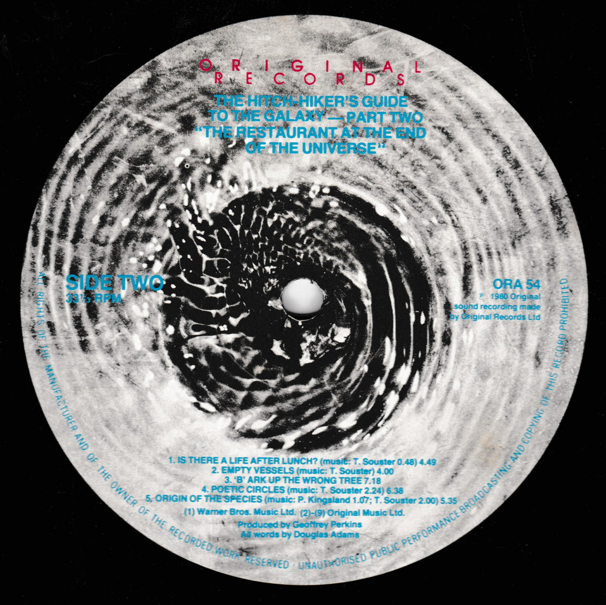 A circular vinyl record label design shown against a black background. The artwork is mostly white and gray with a dark spiral galaxy-like pattern in the center and blue and red text reading track titles and artist text, including 'Side Two' and 'Original Records'.