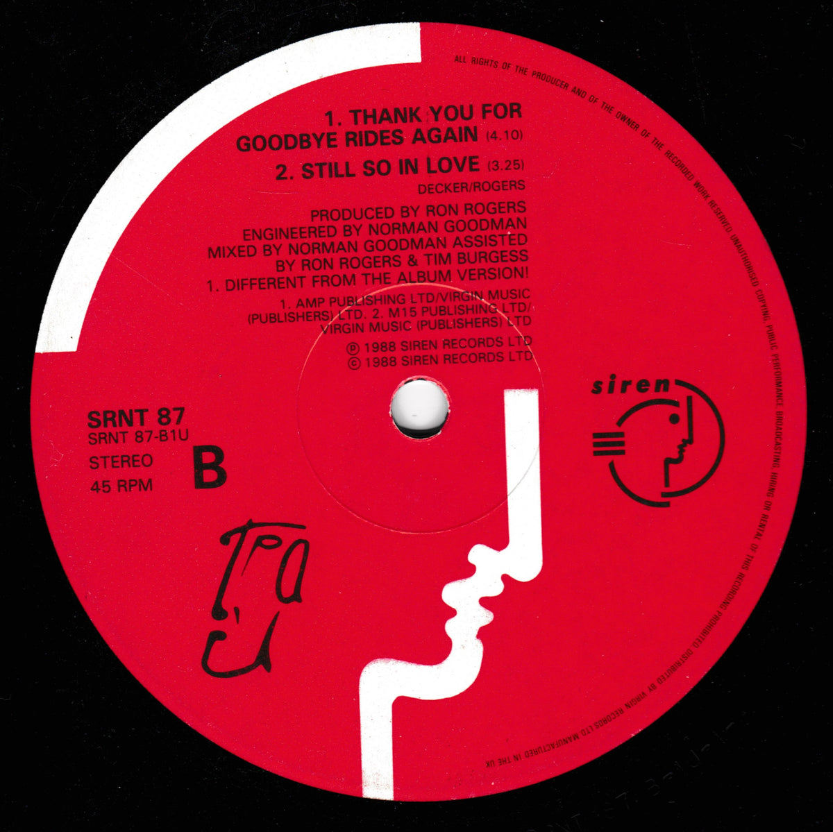 A red vinyl record label with white text and graphics, featuring the Siren Records logo and track listing for 'Goodbye Rides Again' by T'Pau