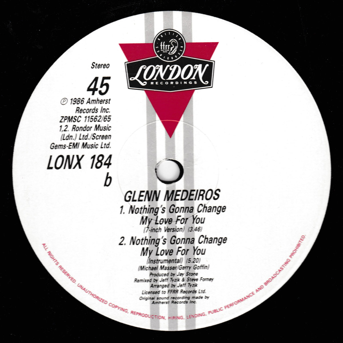 A close-up of a vinyl record label reading London Records, with track listing for Glenn Medeiros's 'My Love For You' on a black background.