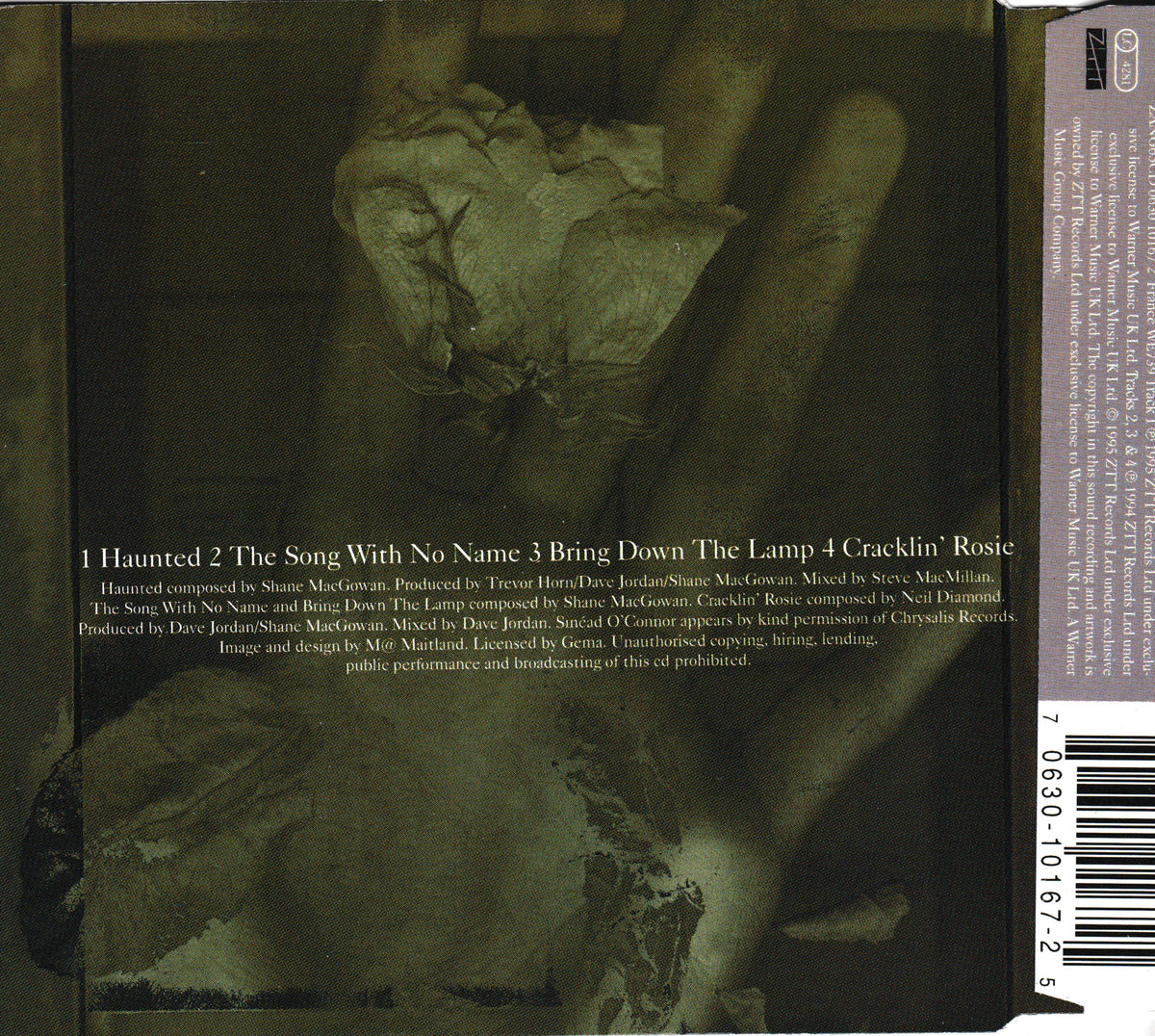 CD single cover and spine artwork for 'Haunted' featuring a dark sepia-toned illustration of a reclining nude figure with track listing text on the back and a barcode on the right edge.