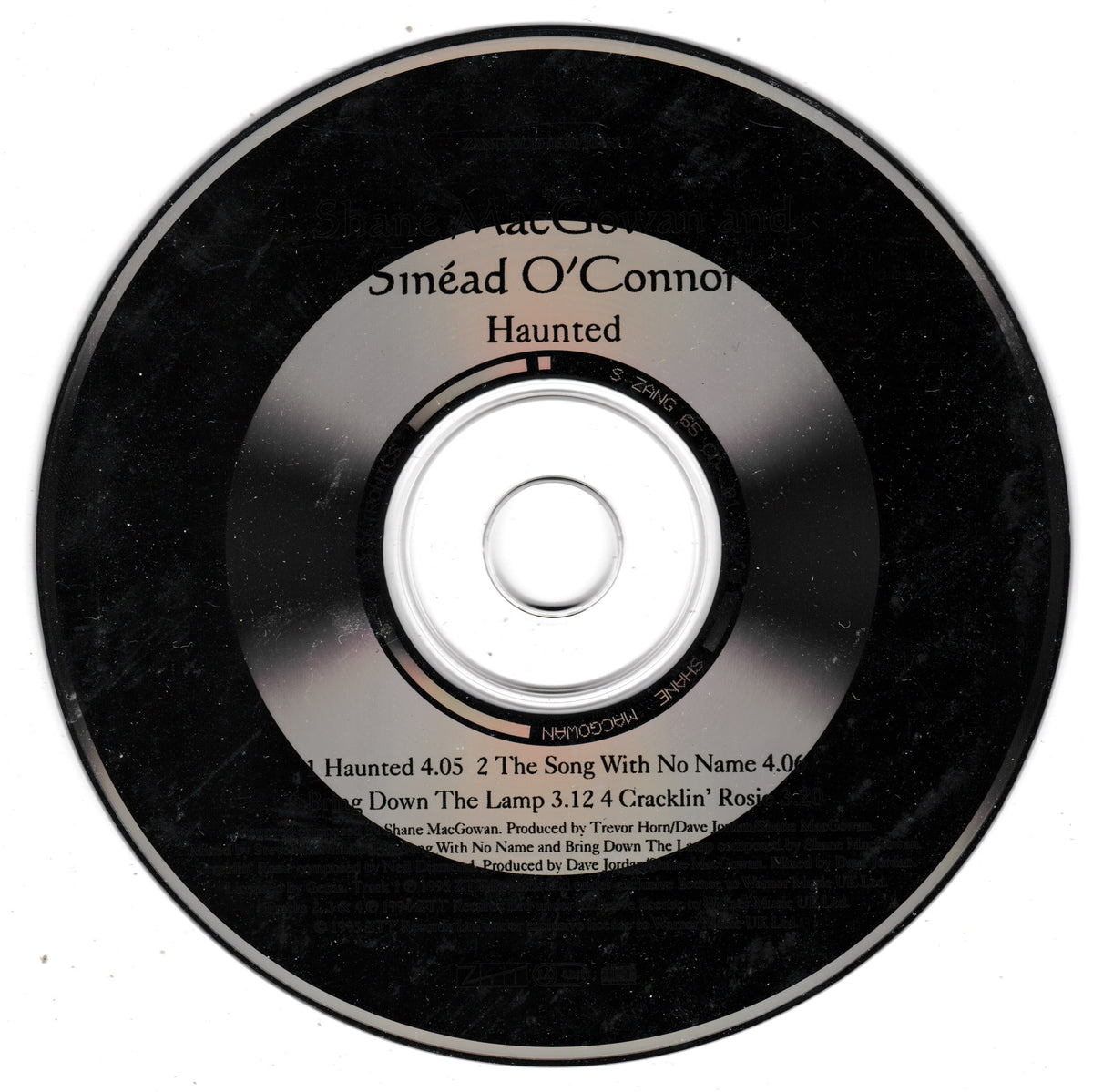 A black compact disc with printed text for 'Haunted' on a plain white background.