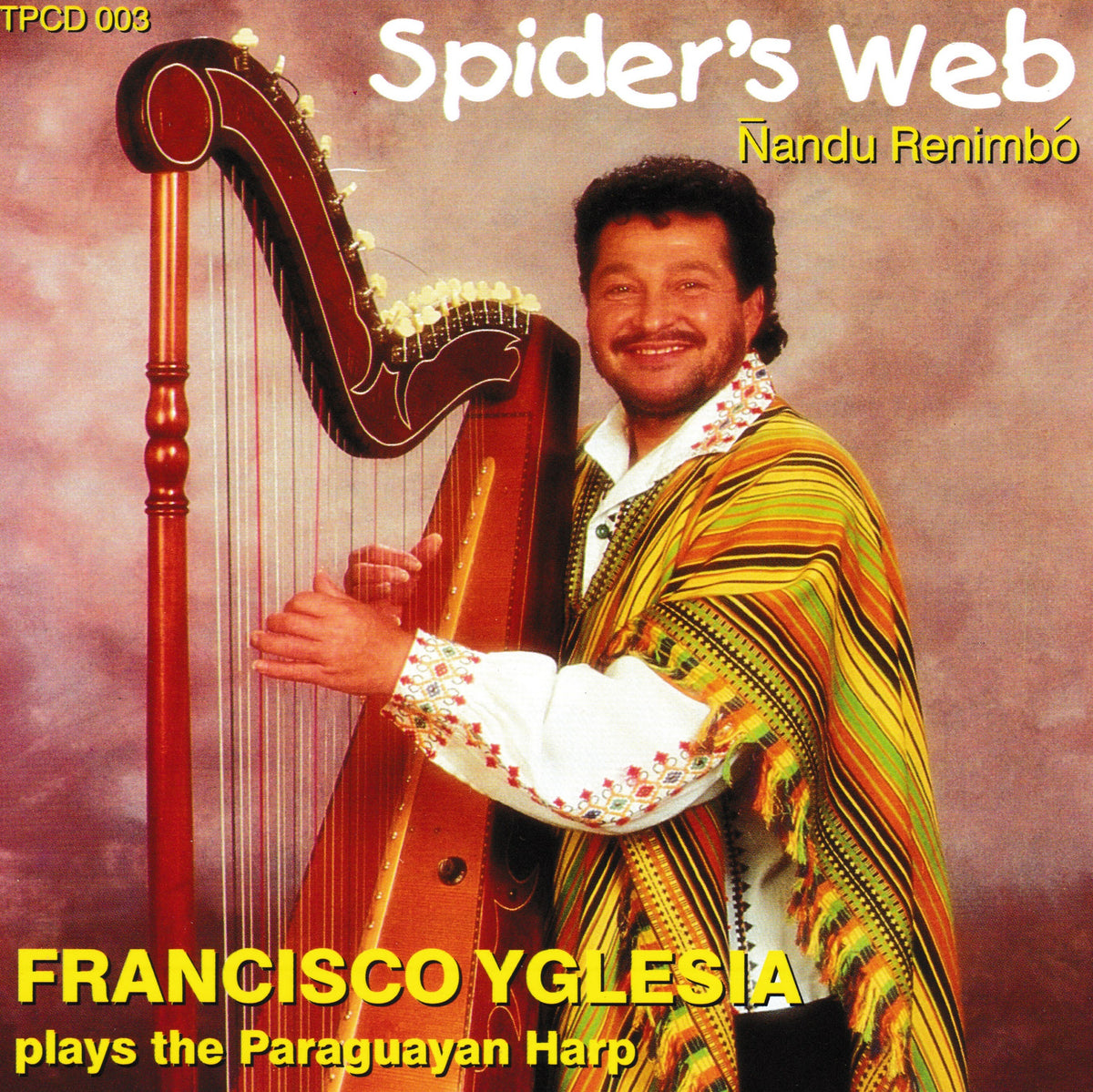 Album cover for 'Spider's Web' featuring Francisco Yglesia playing the Paraguayan harp, with Nandu Renimbó also credited. The cover shows a smiling man in traditional clothing draped in a colorful green, yellow, and orange patterned shawl, standing next to a large wooden harp against a textured pinkish-brown background.