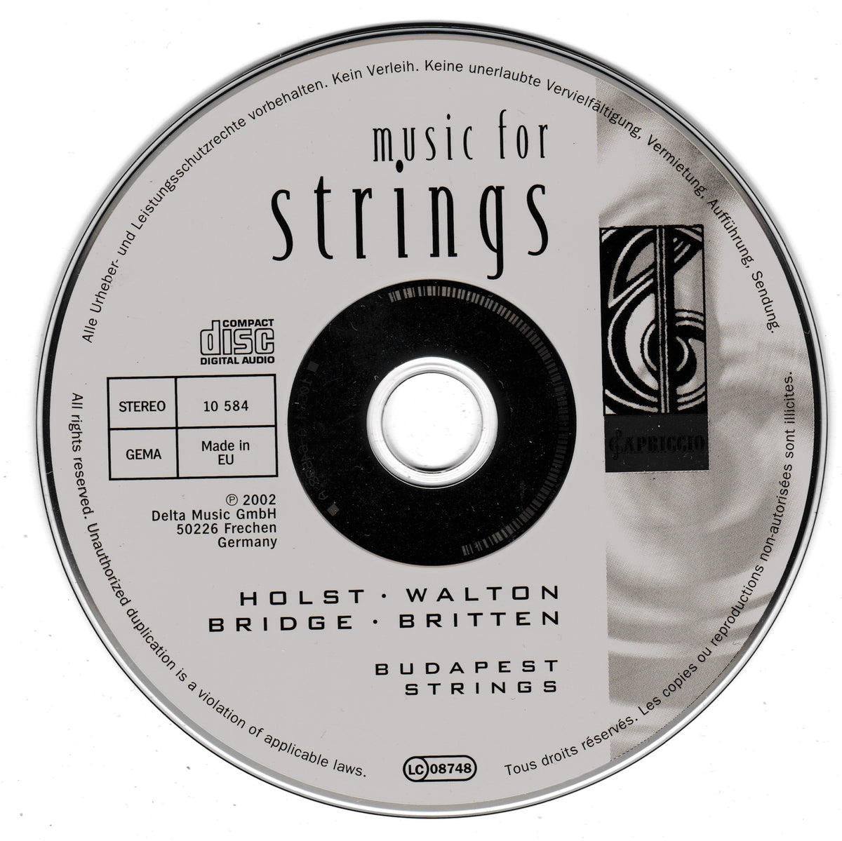 A silver compact disc with a white and black label reading 'music for strings' and listing Holst, Walton, Bridge, and Britten, photographed on a plain light background.
