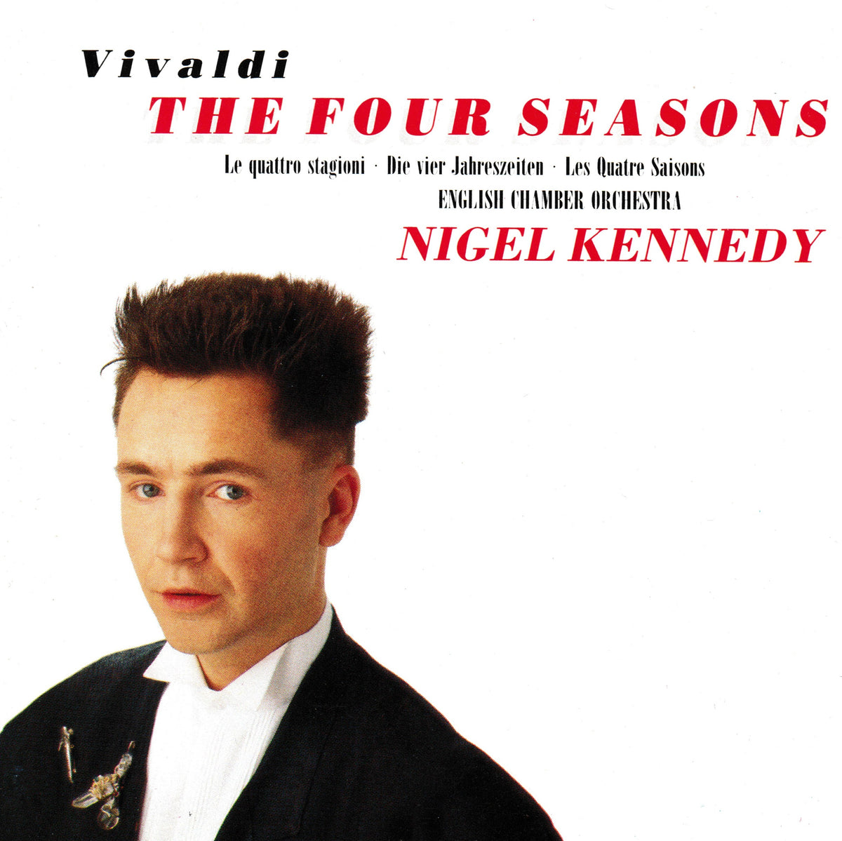 Album cover for Vivaldi's 'The Four Seasons' featuring Nigel Kennedy, with a white background, red and black text, and a portrait of the musician in a black jacket and white shirt.