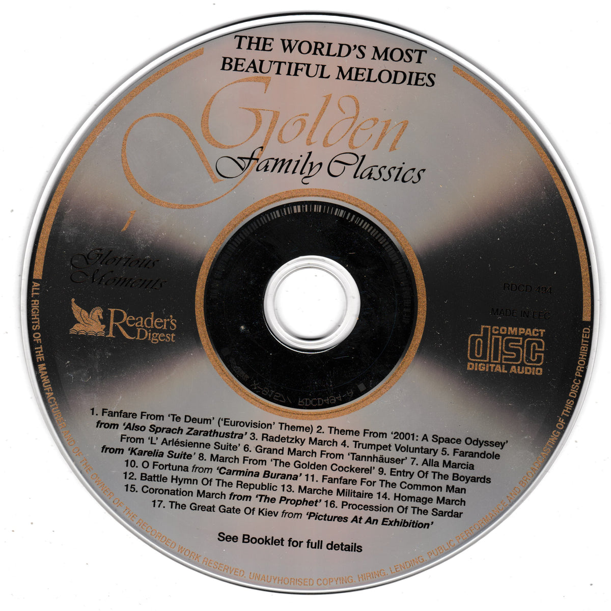 A compact disc for digital audio music titled 'The World's Most Beautiful Melodies Golden Family Classics' by Reader's Digest. The disc features a black and gold design with a tracklist printed at the bottom.
