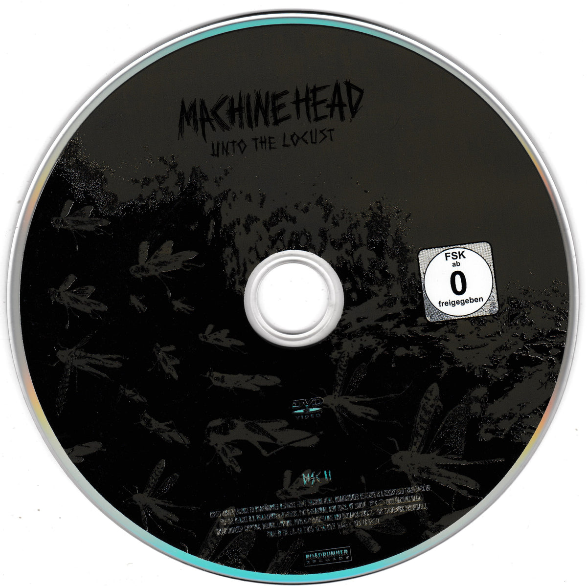 A DVD for 'Machine Head - Unto the Locust' featuring a black cover with silhouetted insects and a white FSK 0 rating sticker on the right.