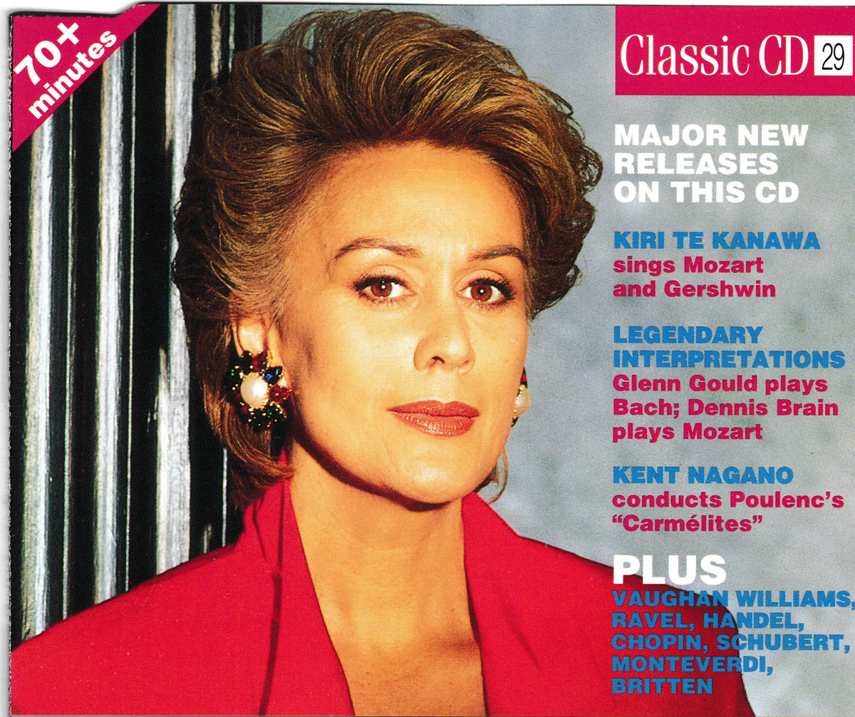 CD cover for a music compilation titled 'Classic CD 29' featuring a close-up portrait of a woman in a red jacket against a gray background with white and blue text listing major new releases.