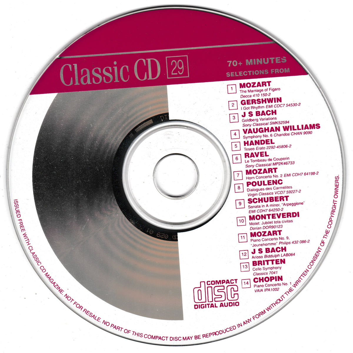 A silver compact disc with a magenta and white label reading 'Classic CD 29' and a tracklist for classical music selections, photographed on a white background.
