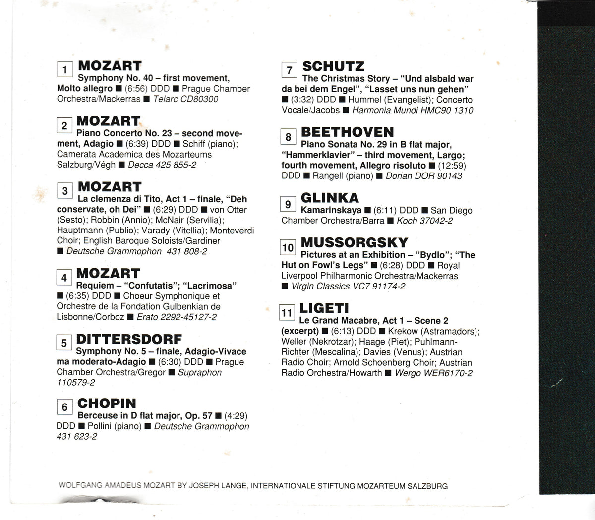 A black-and-white CD inlay showing a numbered music program/list with composers and orchestra names such as Mozart, Beethoven, Bach, Chopin, Schutz, and Ligeti.