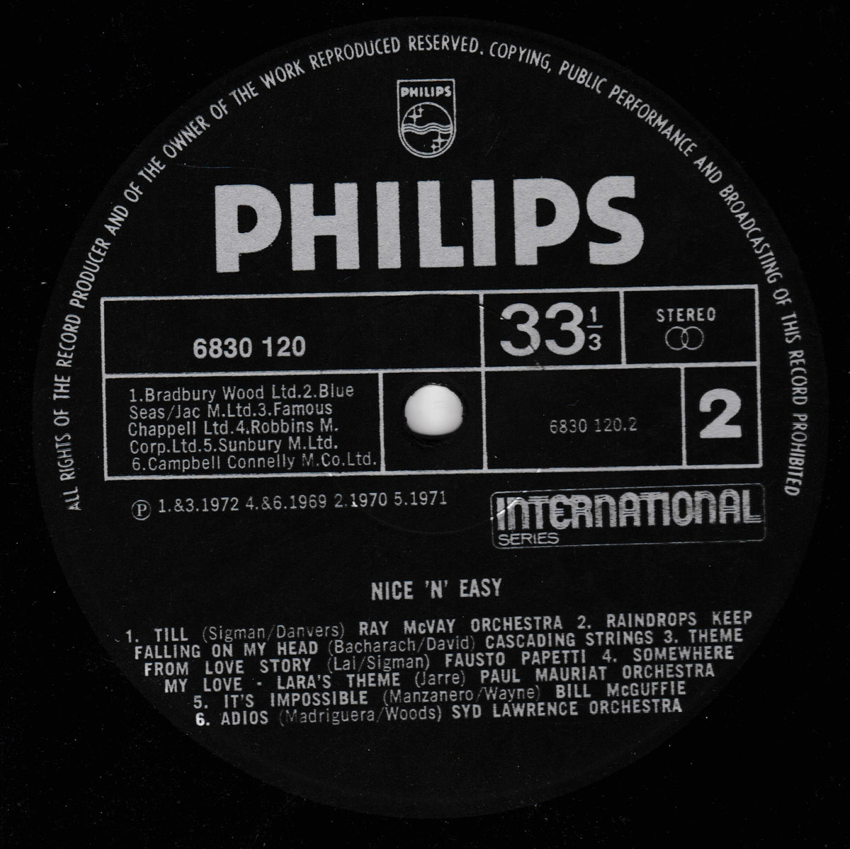 A black vinyl record label with white text, featuring the Philips logo and catalog information for the LP 'Nice 'N Easy'.