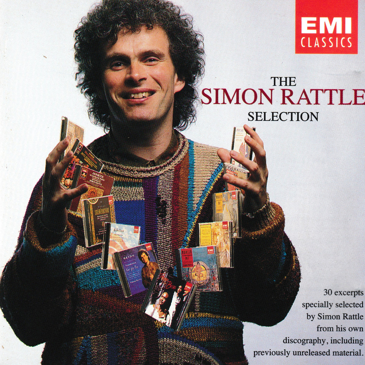 Album cover for 'The Simon Rattle Selection' on EMI Classics, featuring a smiling man with curly hair holding multiple CDs against a white background with red and black text.