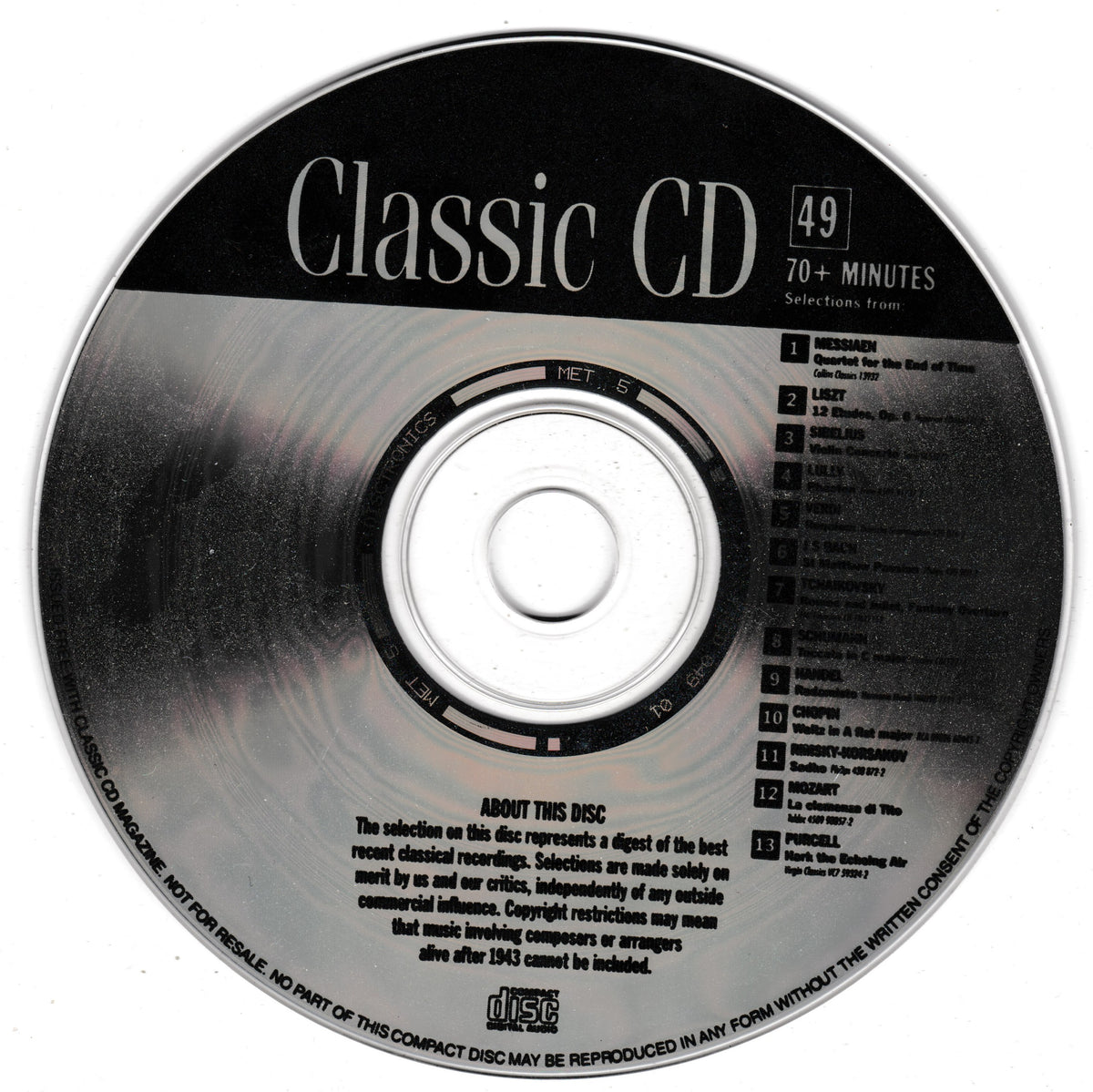 A classic CD disc with a black and silver reflective surface, featuring the text 'Classic CD' and track listing information, photographed on a white background.