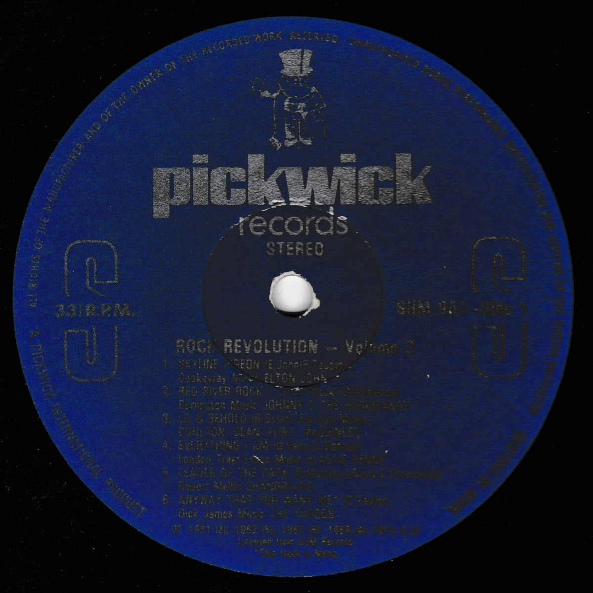 A blue vinyl record label for Pickwick Records, featuring the title 'Rock Revolution - Volume 2' and track listings on a black background.