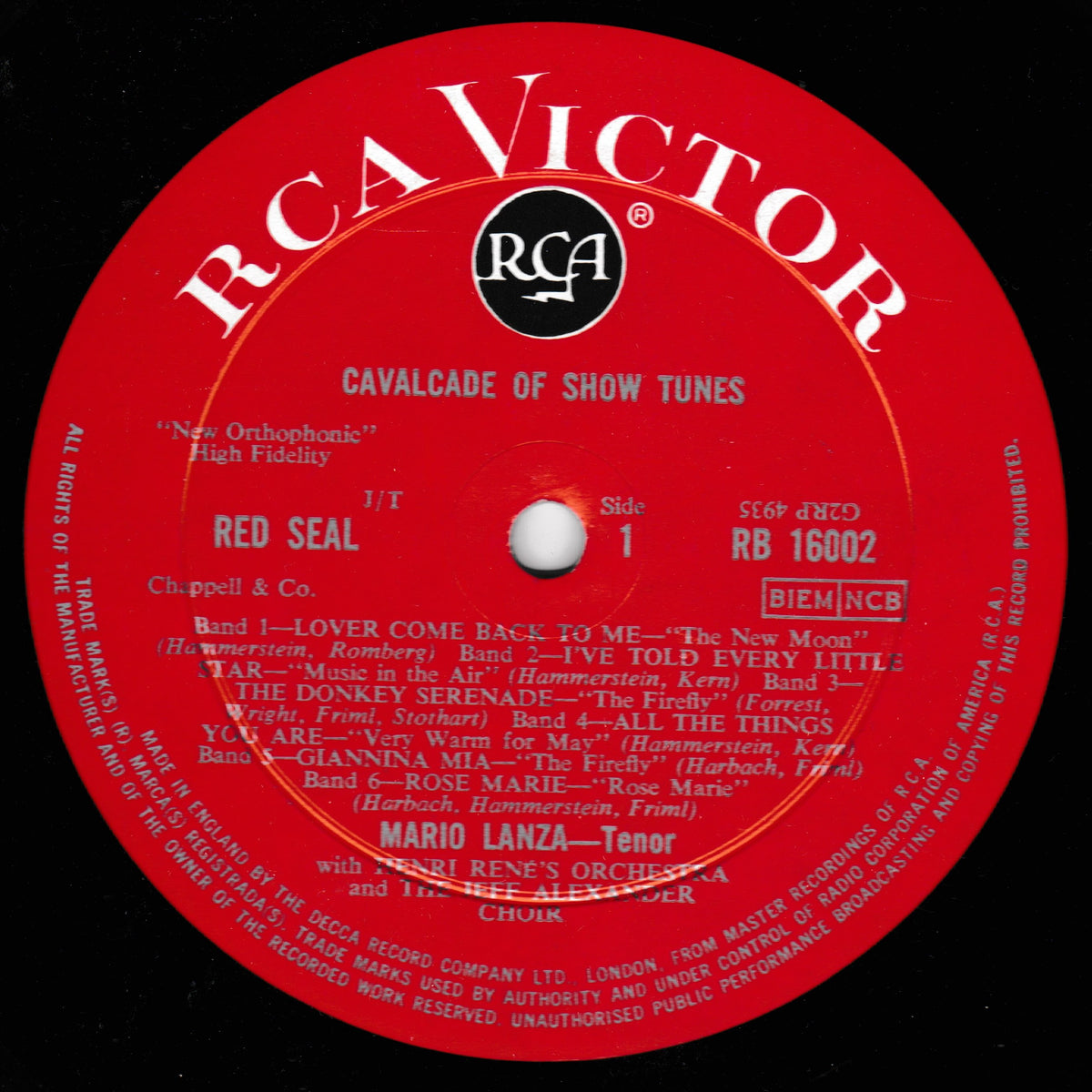 A red vinyl record label for RCA Victor's 'Red Seal' album, featuring white text and the prominent black RCA logo in the center.