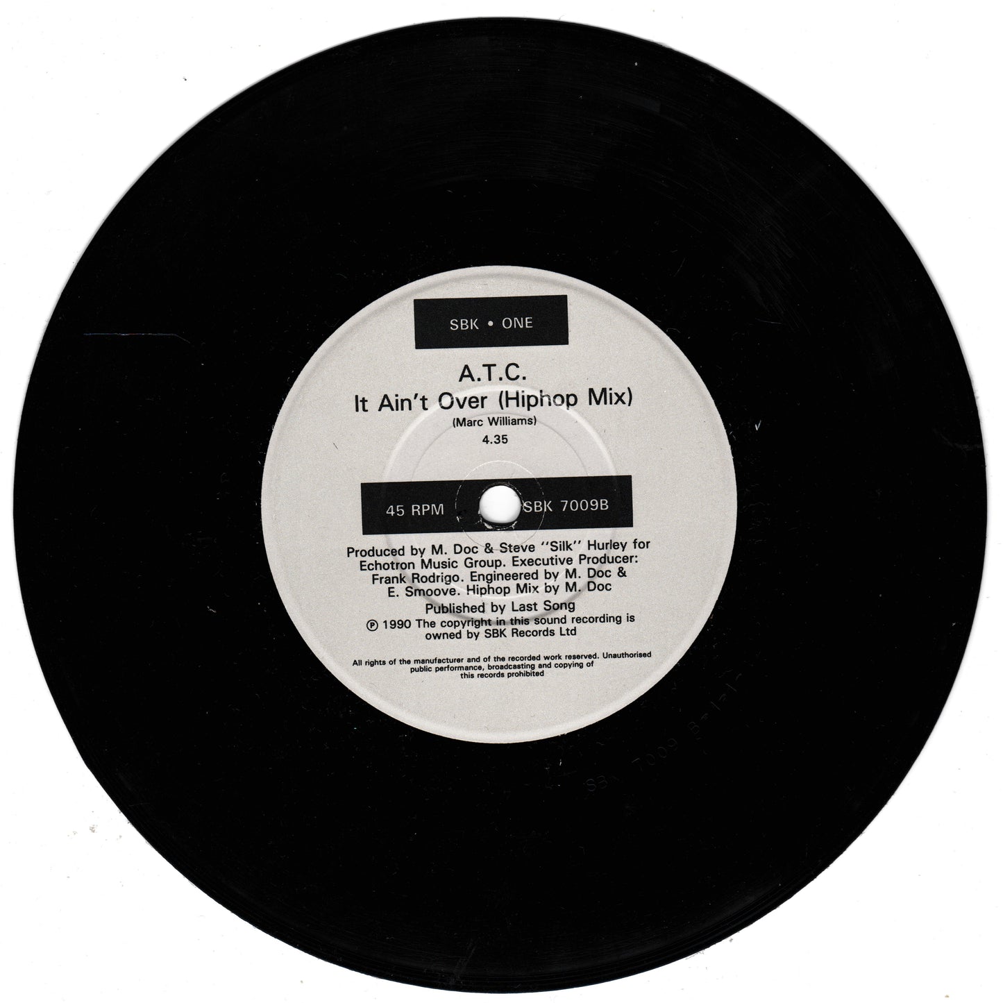 Vinyl record with label showing A.T.C. music track details