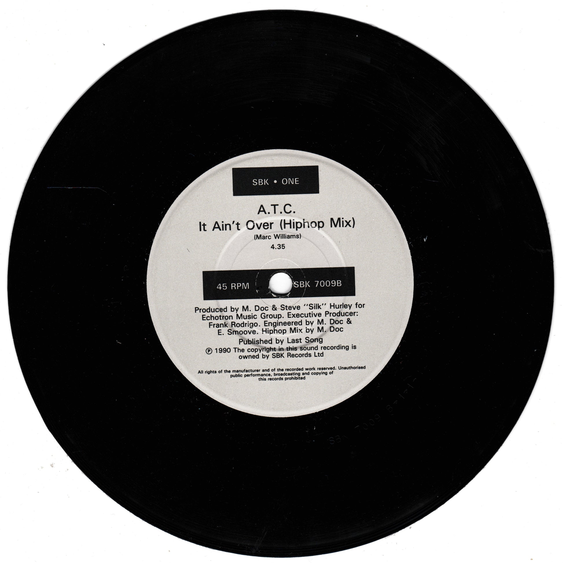 Vinyl record with label showing A.T.C. music track details