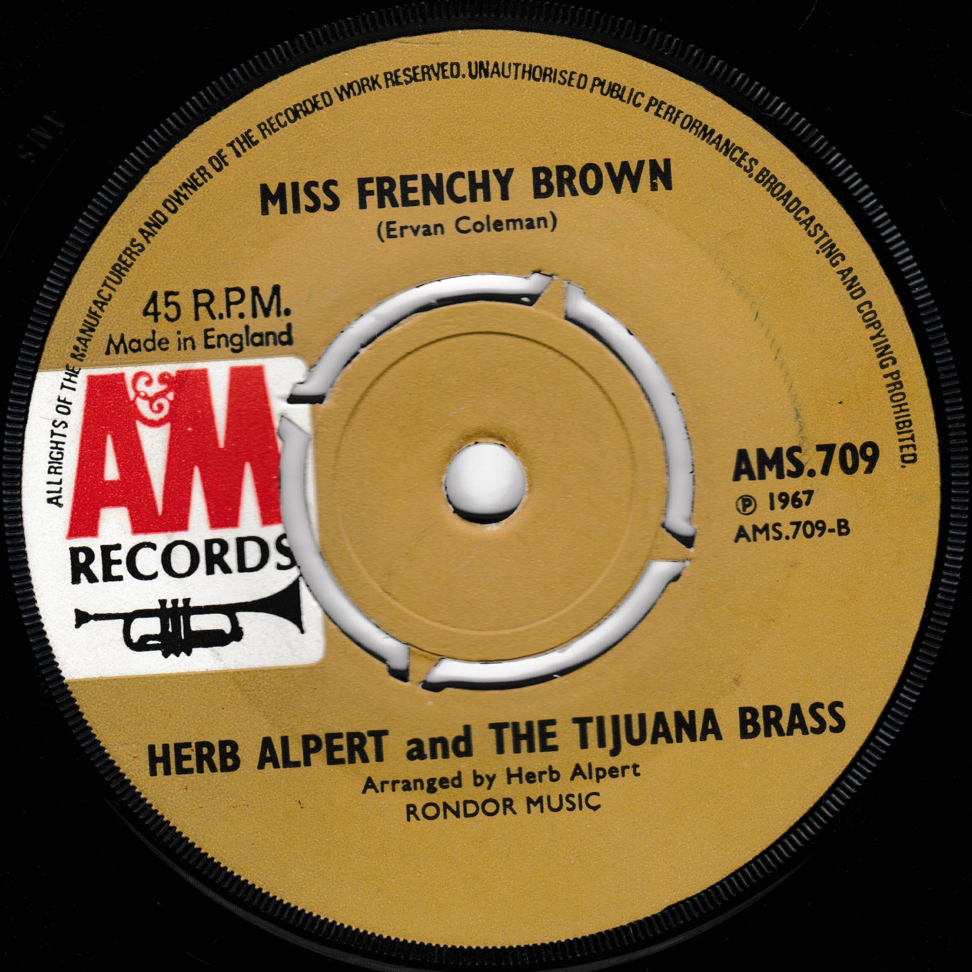 Record label for 'Miss Frenchy Brown' by Herb Alpert and The Tijuana Brass with A&M Records branding.
