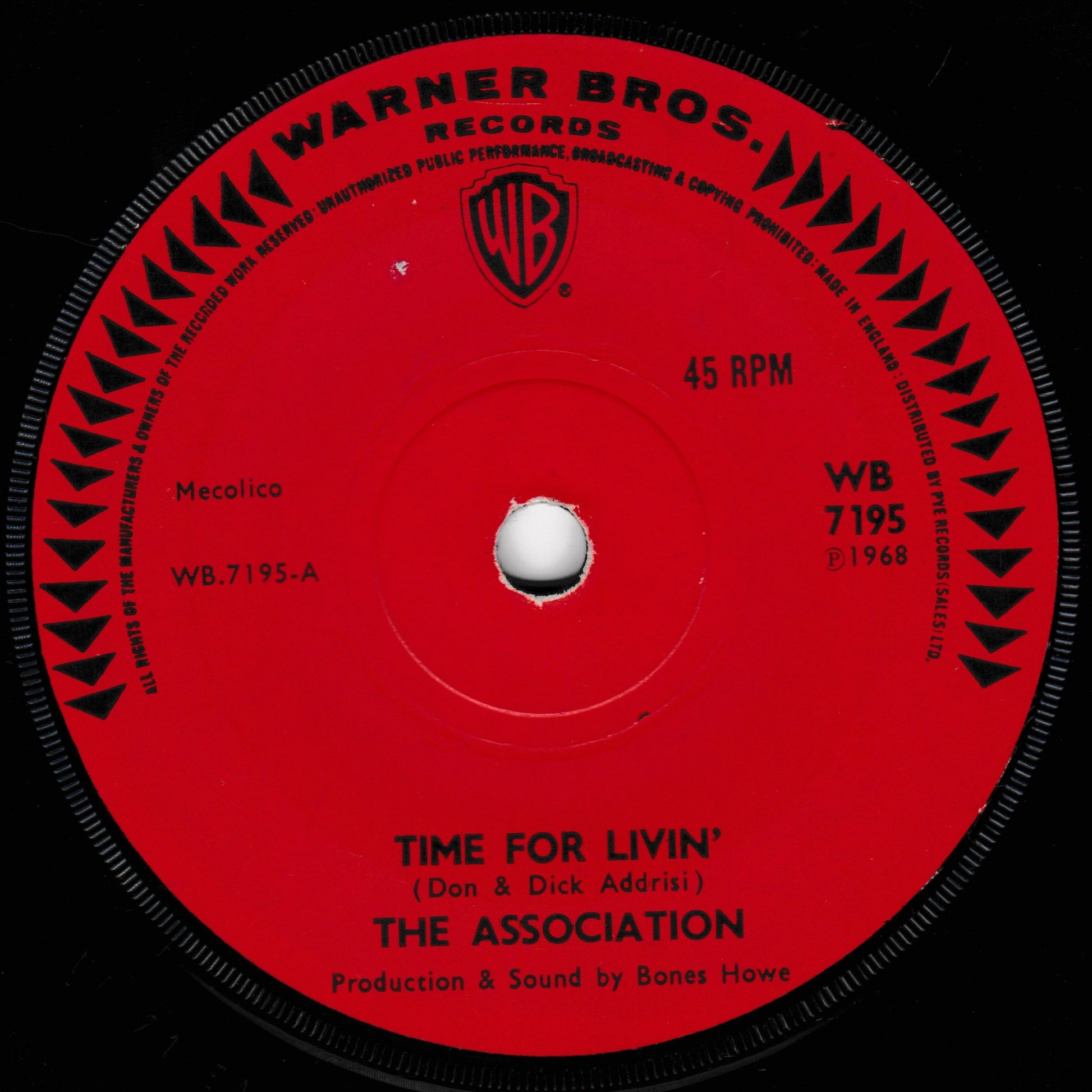 A red vinyl record label from Warner Bros. Records with black text and graphics, featuring the song title 'Time for Livin'' by The Association.