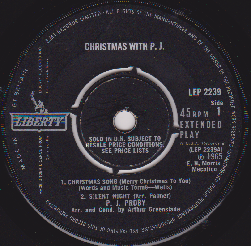 Record label for 'Christmas with P. J.' featuring the Liberty Records logo.