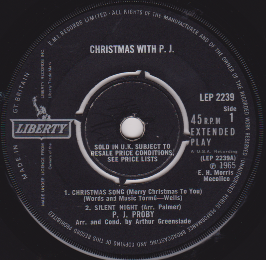 Record label for 'Christmas with P. J.' featuring the Liberty Records logo.