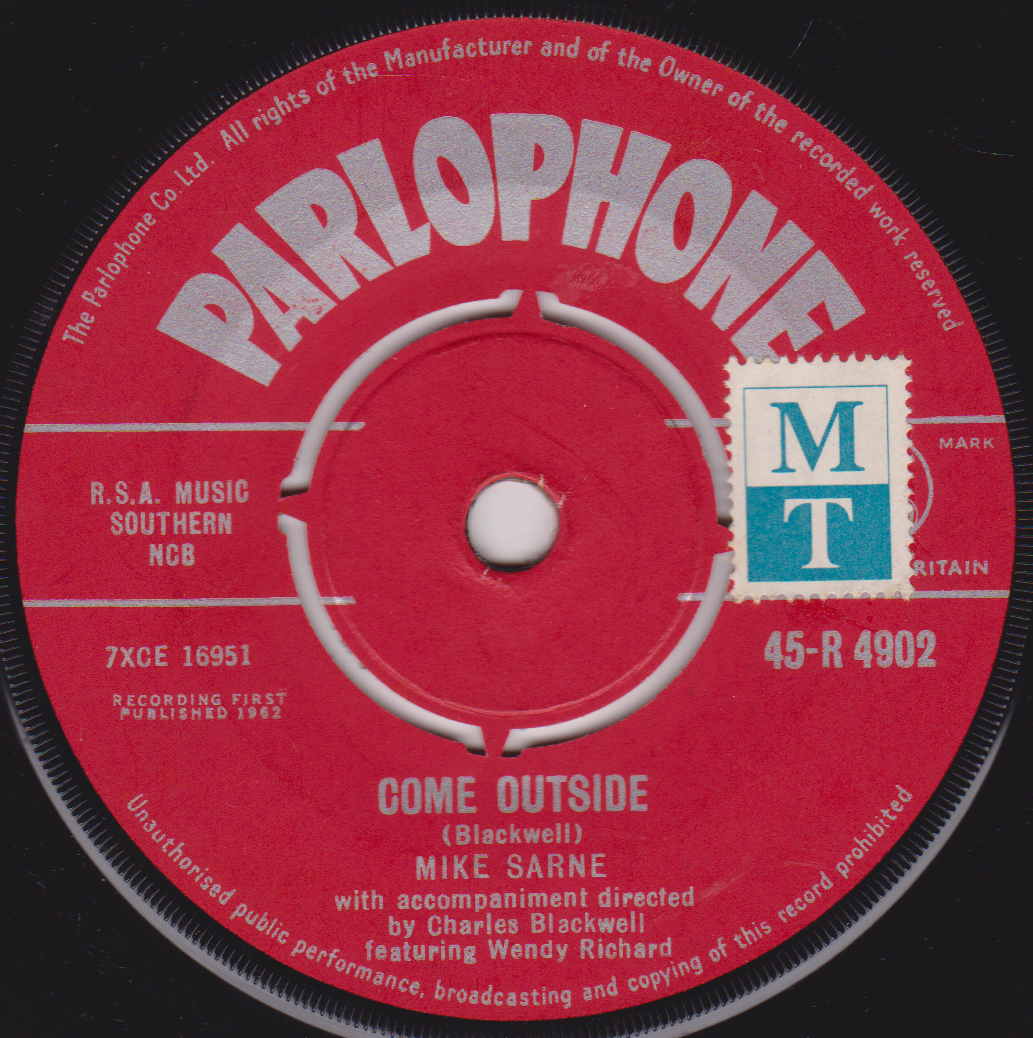 Parlophone record label with text and branding on a red background