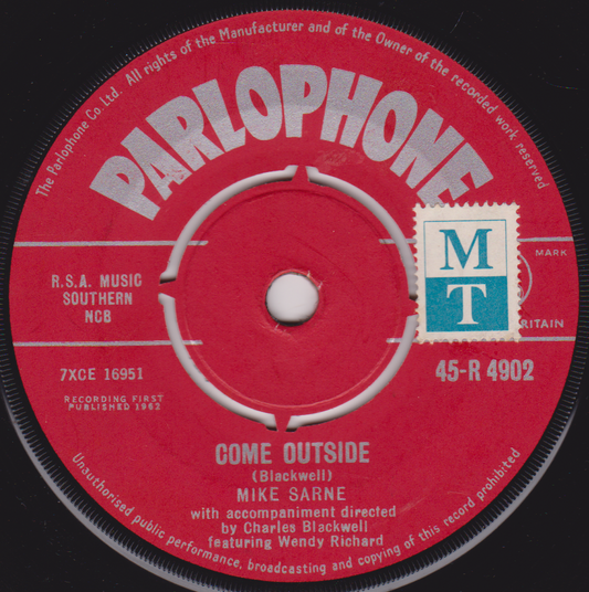 Parlophone record label with text and branding on a red background