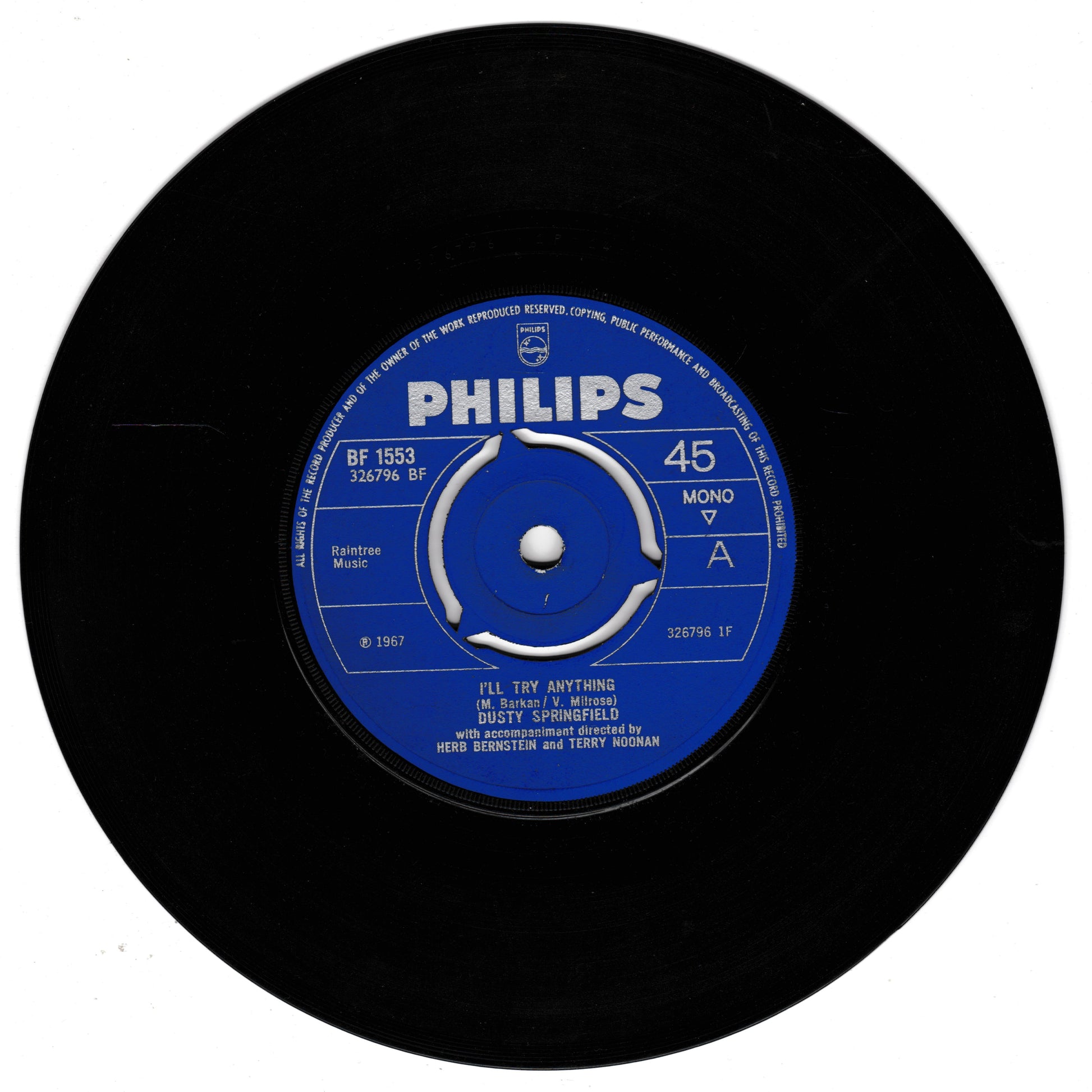 Black vinyl record with a blue Philips label on a white background