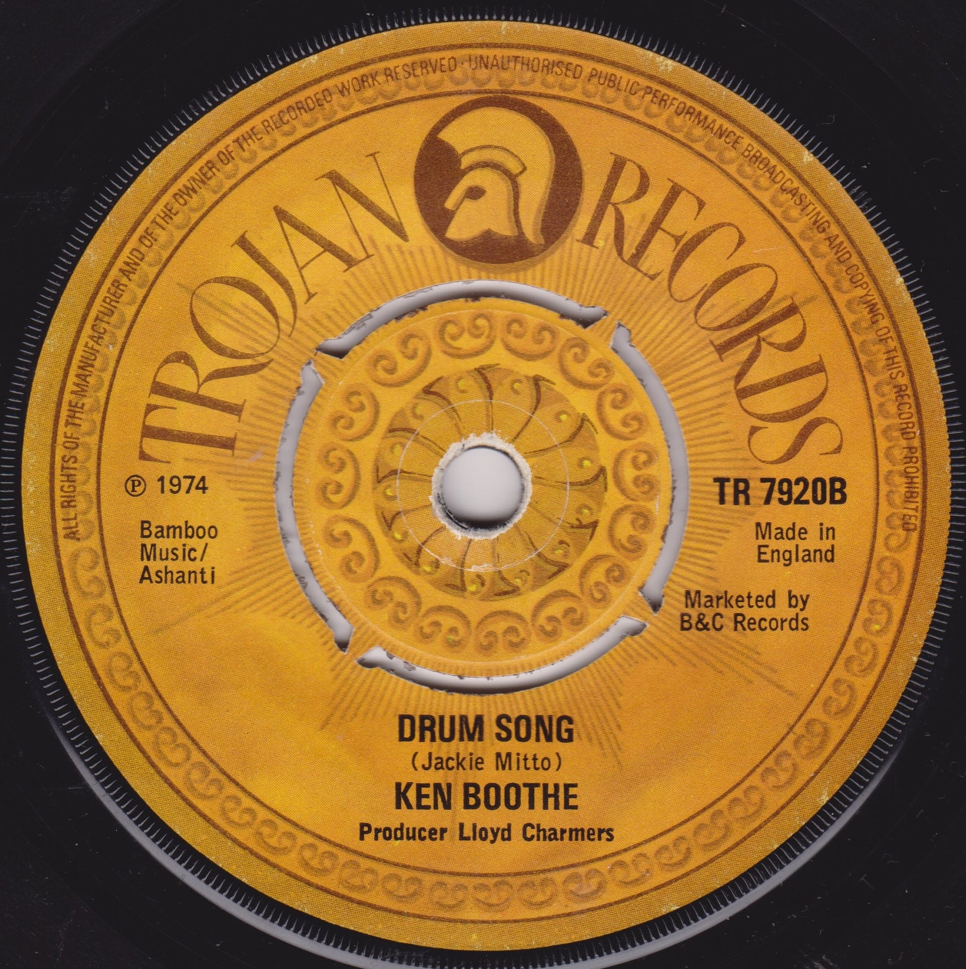 Trojan Records record label with 'Drum Song' by Ken Boothe on a yellow background